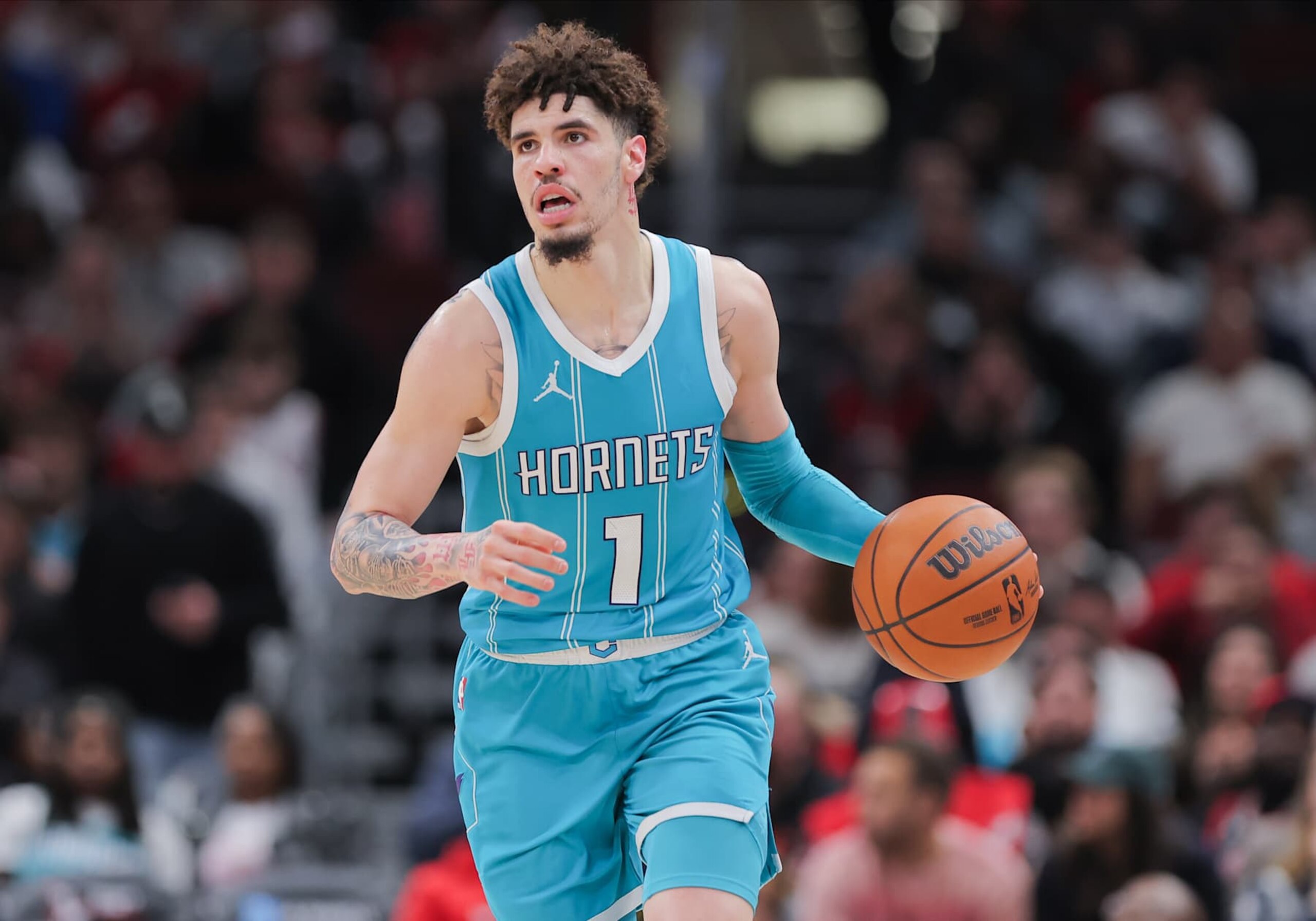 CHICAGO, IL - JANUARY 17: LaMelo Ball #1 of the Charlotte Hornets brings the ball up court during the second half against the Chicago Bulls on January 17, 2025 at the United Center in Chicago, Illinois. (Photo by Melissa Tamez/Icon Sportswire via Getty Images) CHICAGO, IL - JANUARY 17: LaMelo Ball #1 of the Charlotte Hornets brings the ball up court during the second half against the Chicago Bulls on January 17, 2025 at the United Center in Chicago, Illinois. (Photo by Melissa Tamez/Icon Sportswire via Getty Images)