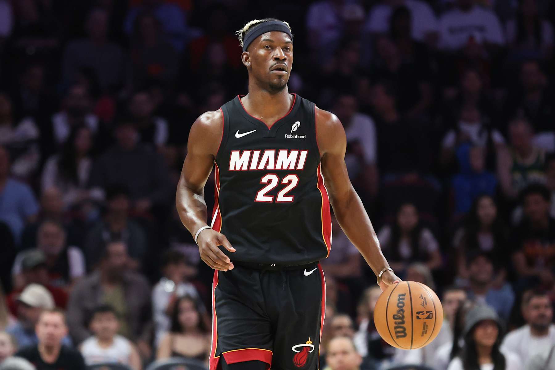 MIAMI, FLORIDA - JANUARY 19: Jimmy Butler #22 of the Miami Heat dribbles the ball against the San Antonio Spurs during the first quarter of the game at Kaseya Center on January 19, 2025 in Miami, Florida. NOTE TO USER: User expressly acknowledges and agrees that, by downloading and or using this photograph, User is consenting to the terms and conditions of the Getty Images License Agreement. (Photo by Megan Briggs/Getty Images)
