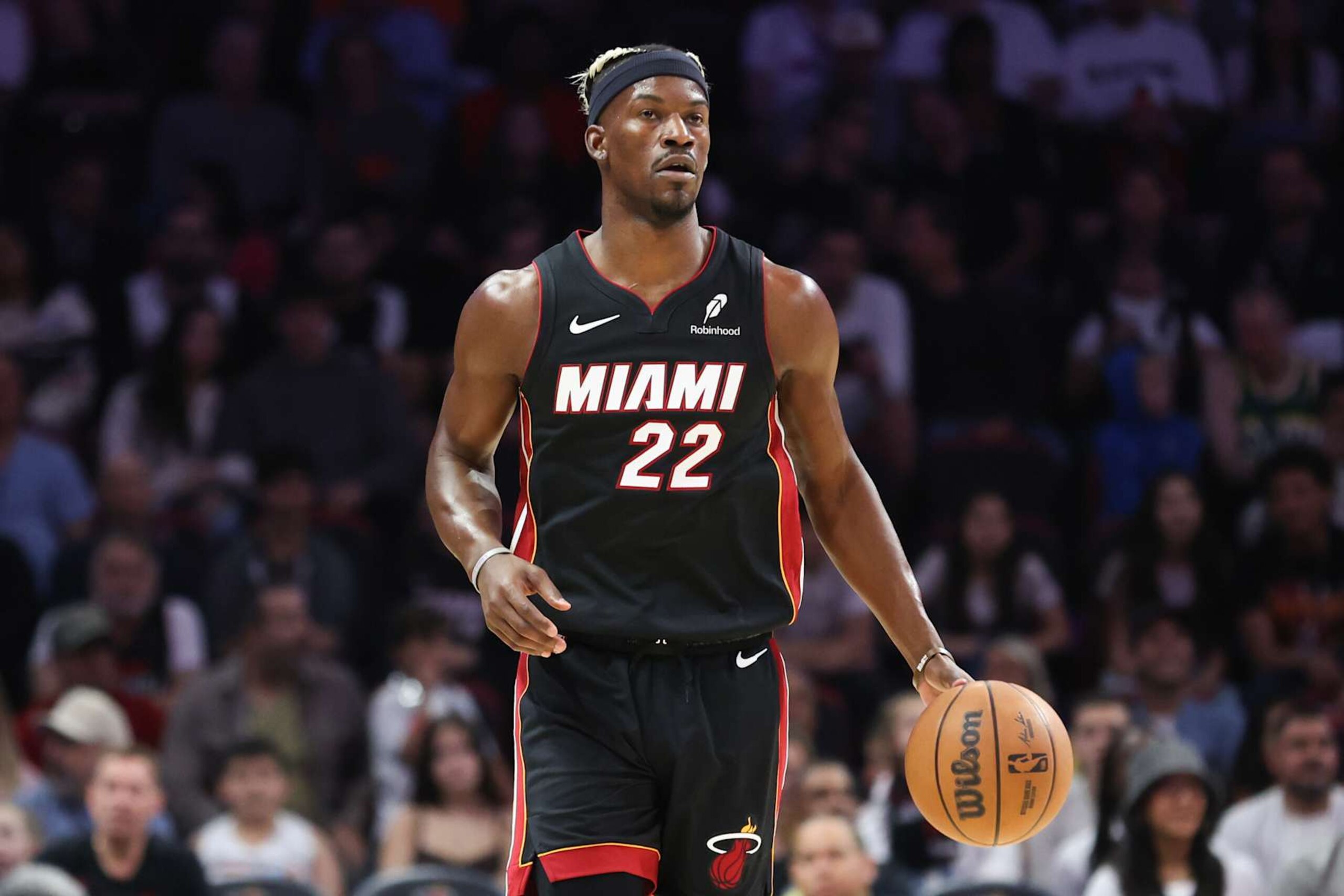 MIAMI, FLORIDA - JANUARY 19: Jimmy Butler #22 of the Miami Heat dribbles the ball against the San Antonio Spurs during the first quarter of the game at Kaseya Center on January 19, 2025 in Miami, Florida. NOTE TO USER: User expressly acknowledges and agrees that, by downloading and or using this photograph, User is consenting to the terms and conditions of the Getty Images License Agreement. (Photo by Megan Briggs/Getty Images)