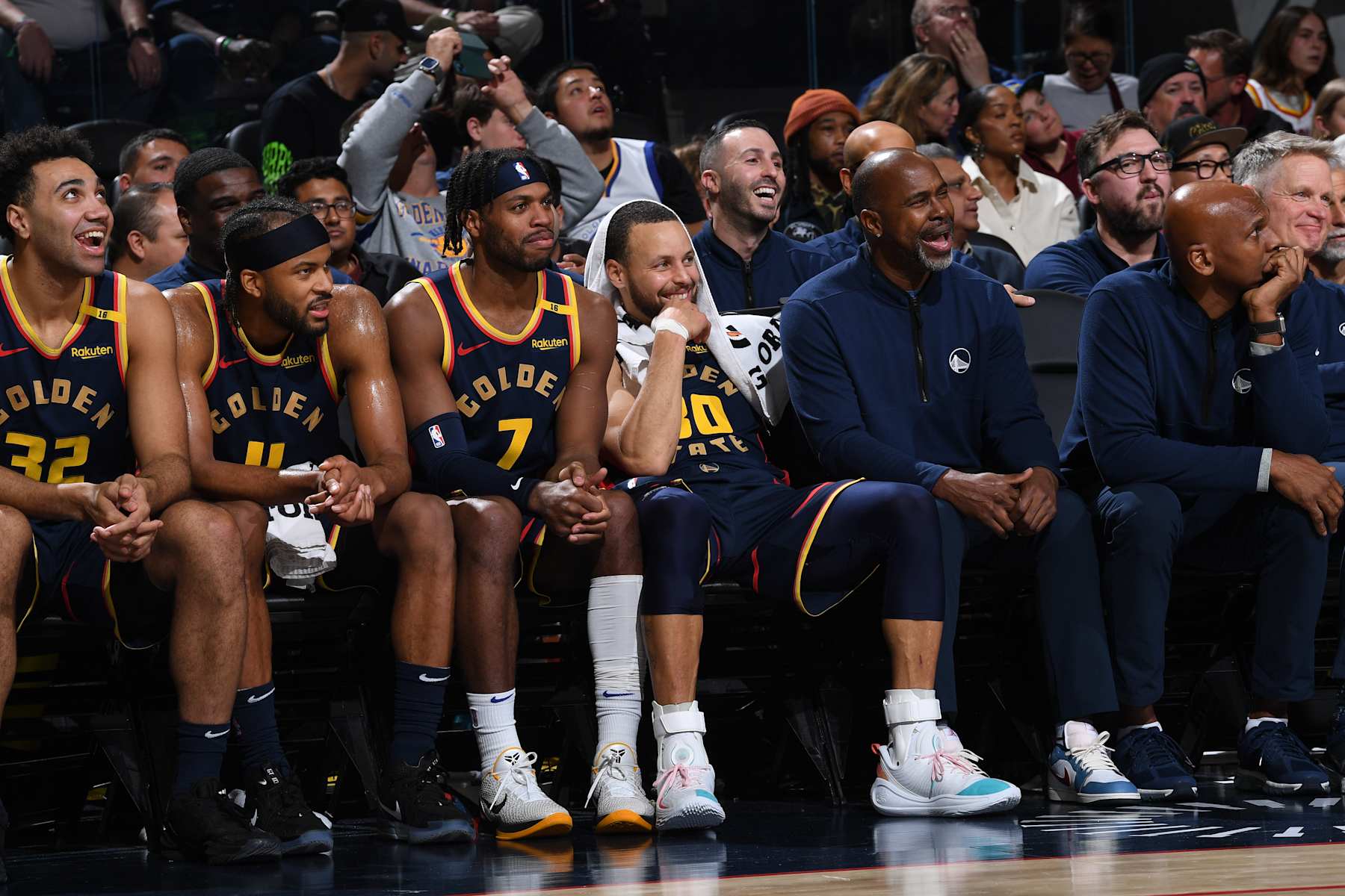 SAN FRANCISCO, CA - JANUARY 23: Golden State Warriors players and coaches smile on the bench during the game against the Chicago Bulls on January 23, 2025 at Chase Center in San Francisco, California. NOTE TO USER: User expressly acknowledges and agrees that, by downloading and or using this photograph, user is consenting to the terms and conditions of Getty Images License Agreement. Mandatory Copyright Notice: Copyright 2025 NBAE (Photo by Noah Graham/NBAE via Getty Images)