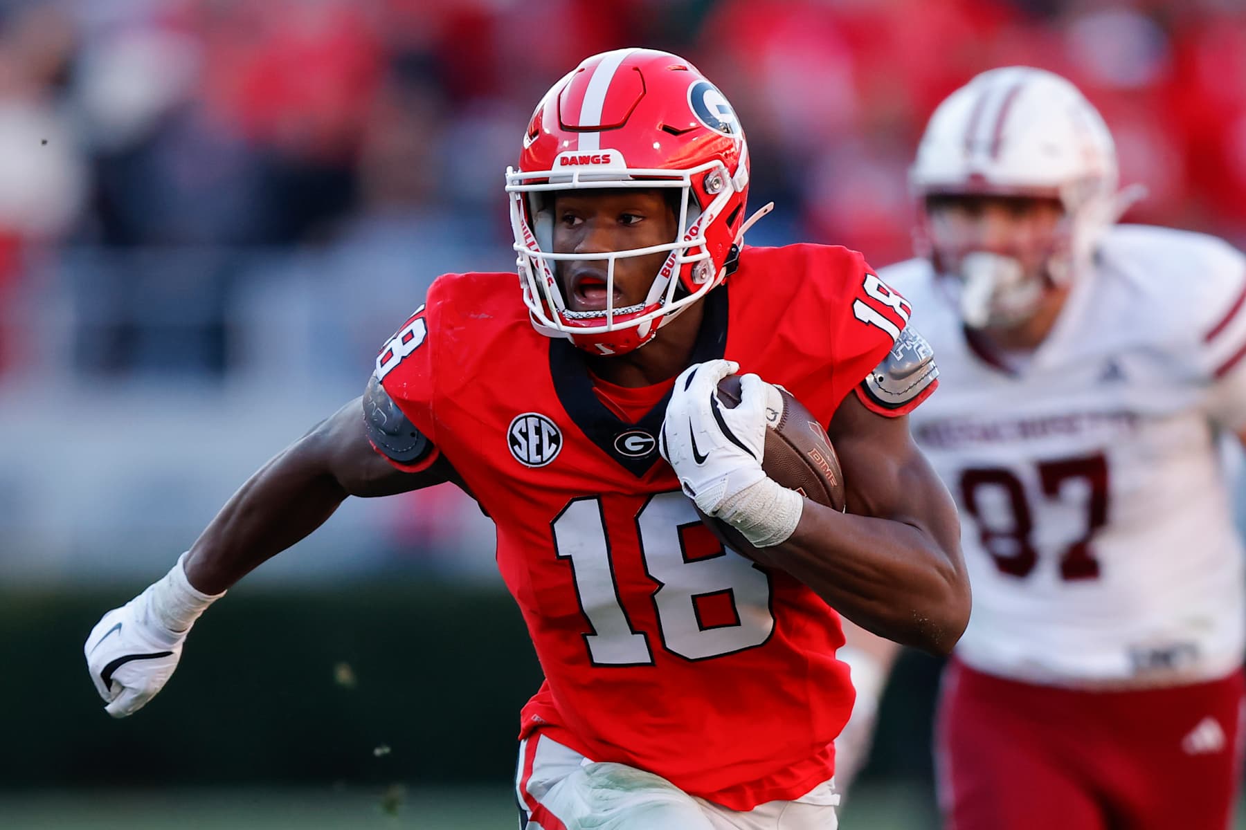 ATHENS, GEORGIA - NOVEMBER 23: Chris Cole #18 of the Georgia Bulldogs recovers a fumble and runs it back for a touchdown during the fourth quarter against the Massachusetts Minutemen at Sanford Stadium on November 23, 2024 in Athens, Georgia.  (Photo by Todd Kirkland/Getty Images)