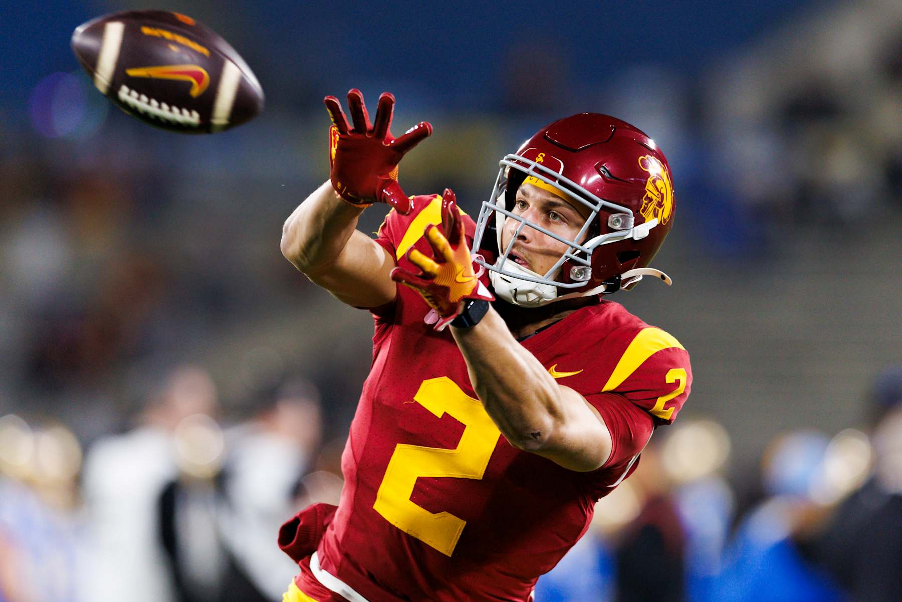 PASADENA, CALIFORNIA - NOVEMBER 23: Duce Robinson #2 of the USC Trojans catches the ball before a game against UCLA Bruins at Rose Bowl on November 23, 2024 in Pasadena, California. (Photo by Ric Tapia/Getty Images)