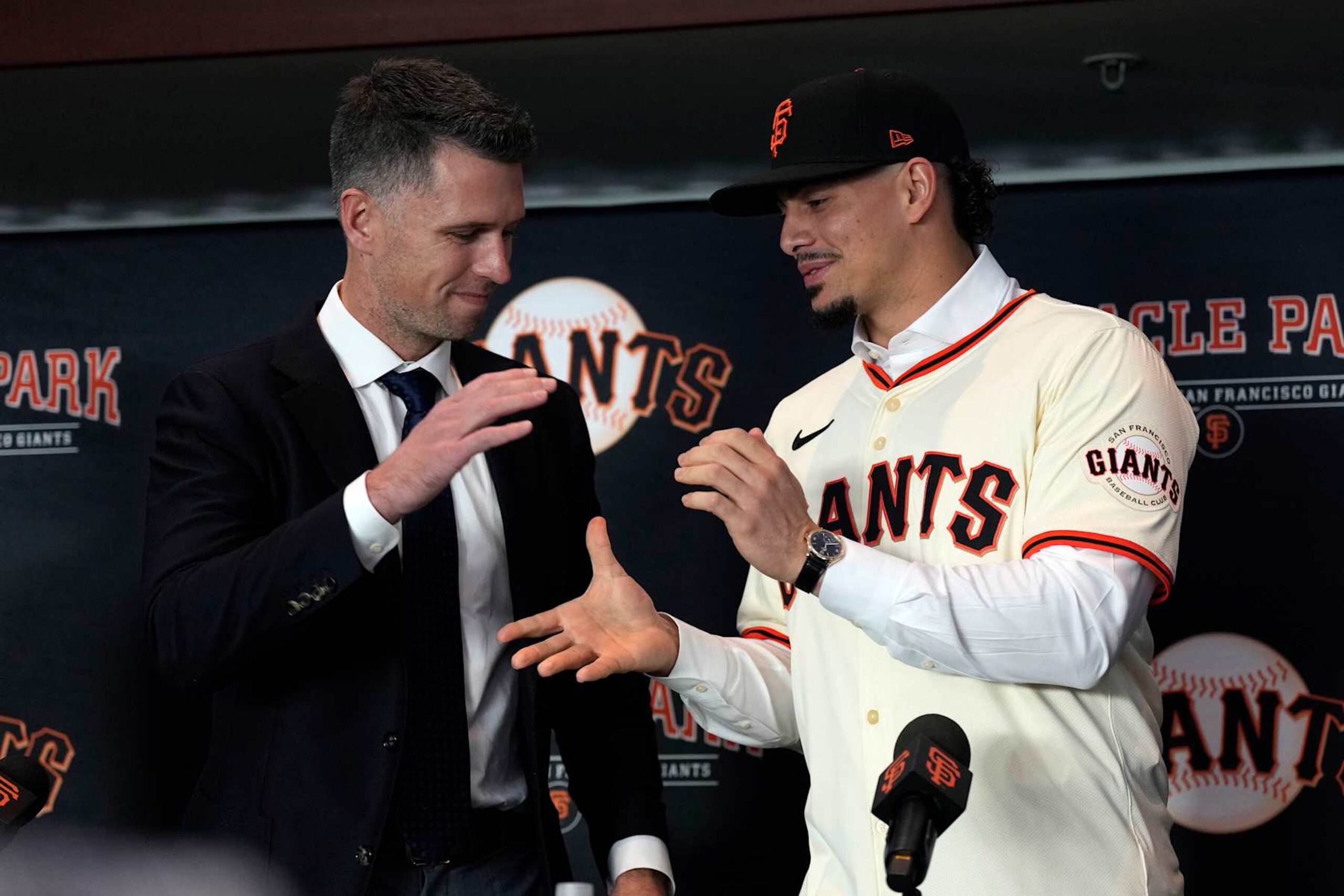 Buster Posey (L) and Willy Adames (R)