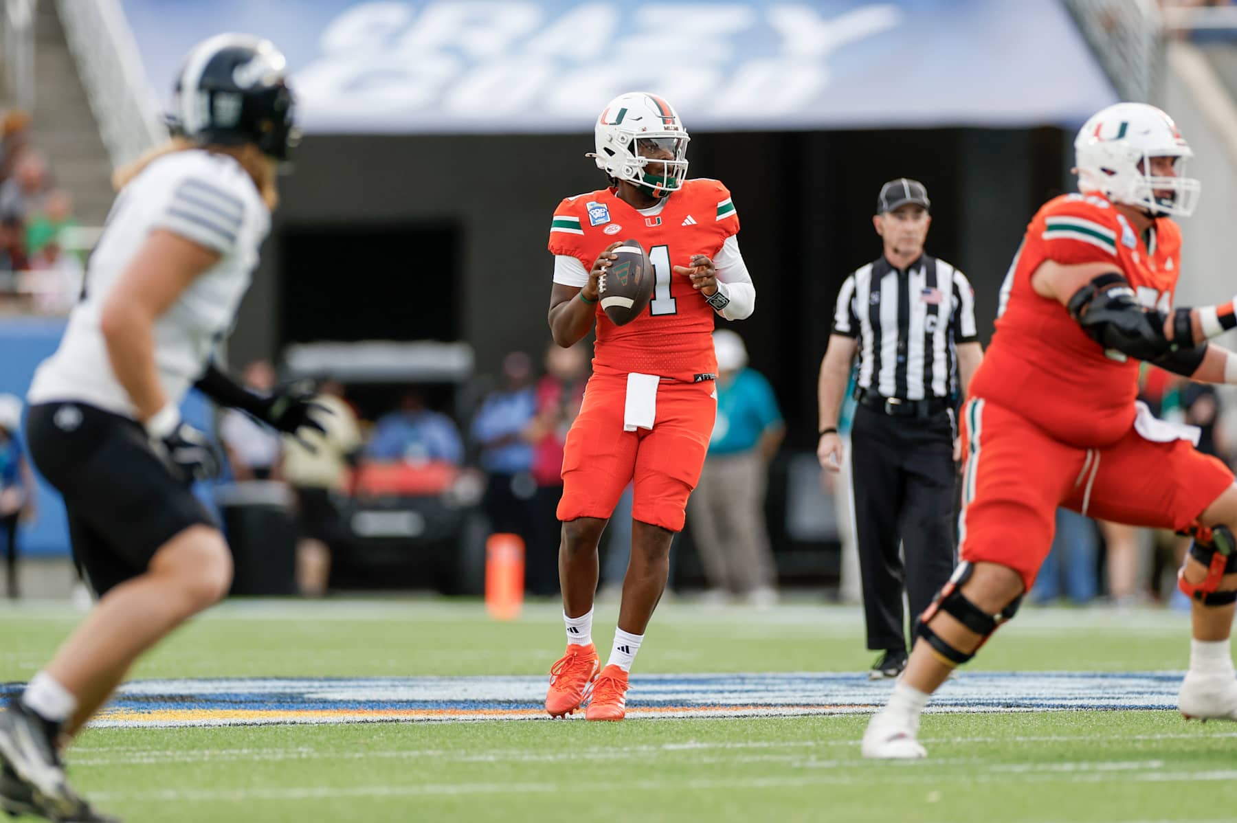 ORLANDO, FL - DECEMBER 28: Miami Hurricanes quarterback Cam Ward (1) looks for a receiver during the game between the Miami Hurricanes and the Iowa State Cyclones on December 28, 2024 at Camping World Stadium in Orlando, Fl. (Photo by David Rosenblum/Icon Sportswire via Getty Images)