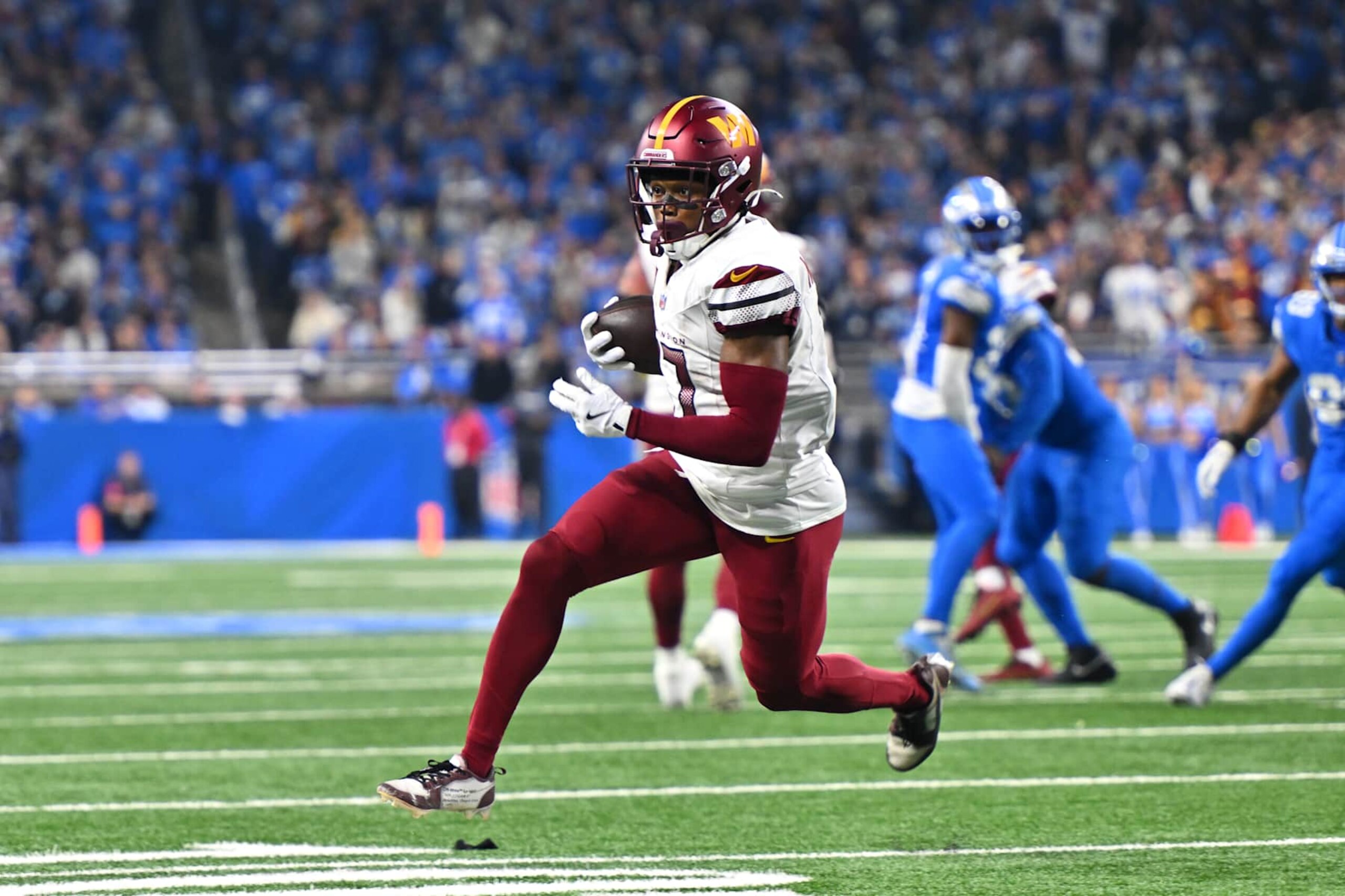 DETROIT, MI - JANUARY 18: Washington Commanders wide receiver Terry McLaurin (17) runs after the catch during the NFC Divisional Playoff game between the Detroit Lions and the Washington Commanders on Sunday January 18, 2025 at Ford Field in Detroit, MI. (Photo by Steven King/Icon Sportswire via Getty Images)