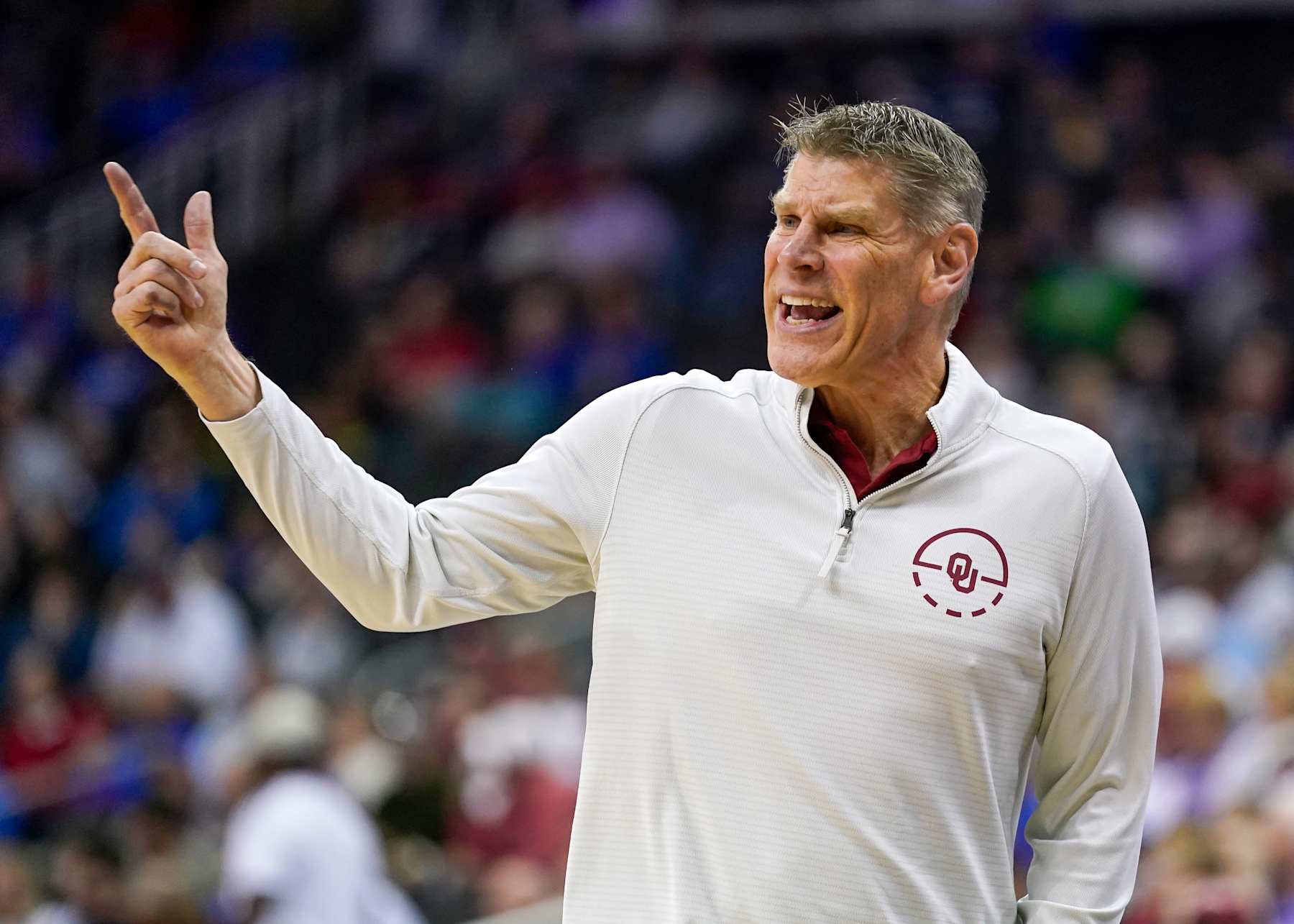 KANSAS CITY, MISSOURI - MARCH 13: Head coach Porter Moser of the Oklahoma Sooners reacts during the first half of the game against the TCU Horned Frogs in the second round of the Big 12 Men's Basketball Tournament at T-Mobile Center on March 13, 2024 in Kansas City, Missouri. (Photo by Jay Biggerstaff/Getty Images) KANSAS CITY, MISSOURI - MARCH 13: Head coach Porter Moser of the Oklahoma Sooners reacts during the first half of the game against the TCU Horned Frogs in the second round of the Big 12 Men's Basketball Tournament at T-Mobile Center on March 13, 2024 in Kansas City, Missouri. (Photo by Jay Biggerstaff/Getty Images)