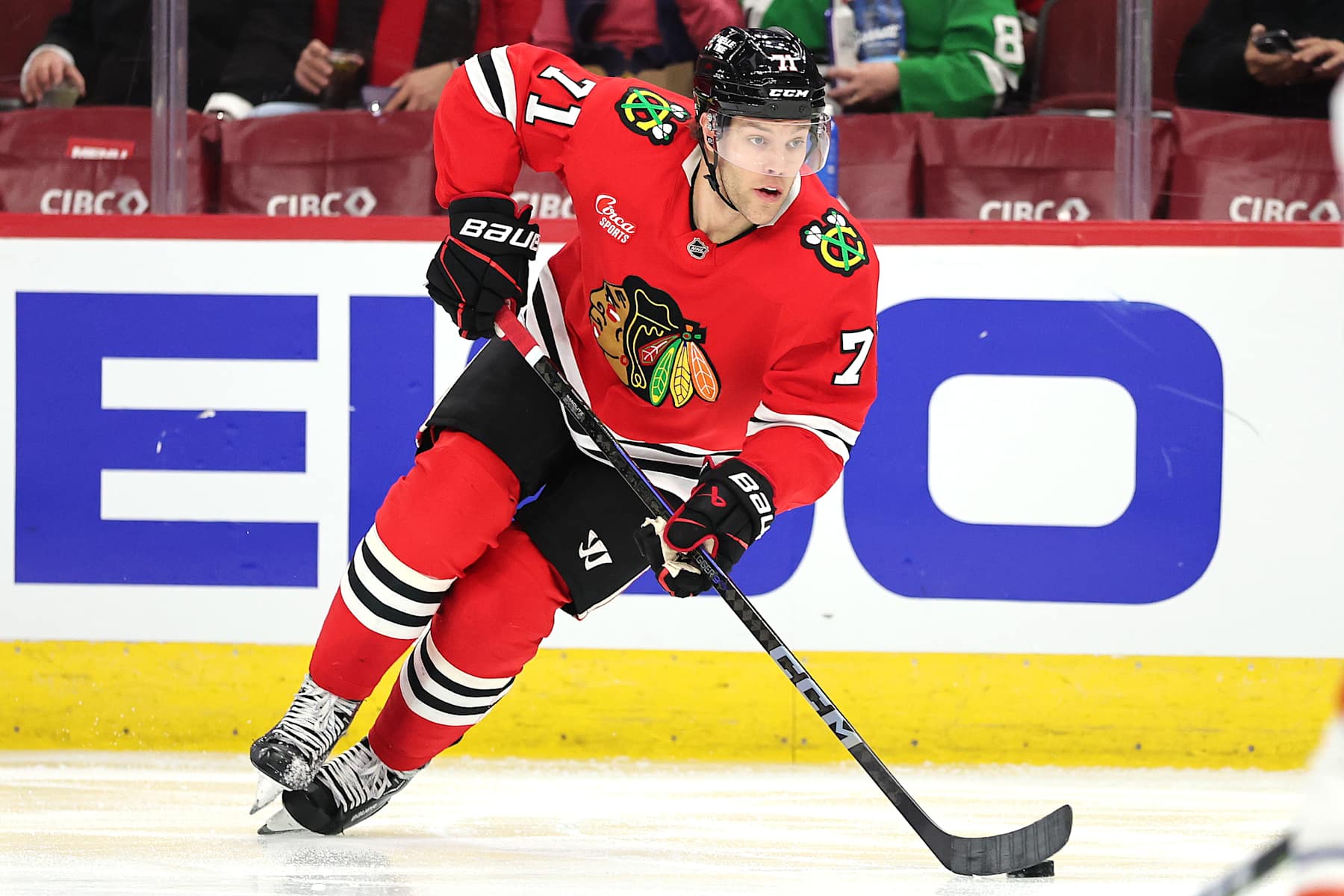 CHICAGO, ILLINOIS - JANUARY 11: Taylor Hall #71 of the Chicago Blackhawks skates with the puck against the Edmonton Oilers during the second period at the United Center on January 11, 2025 in Chicago, Illinois. (Photo by Michael Reaves/Getty Images)