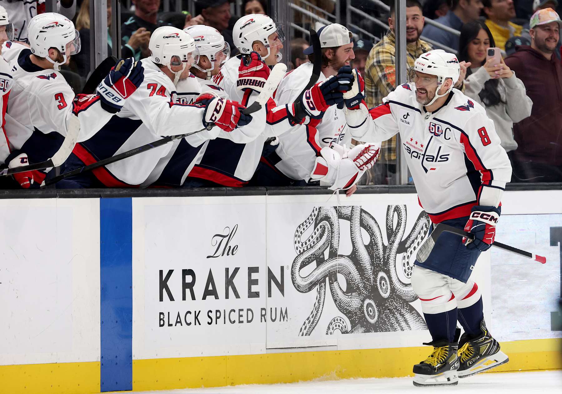 SEATTLE, WASHINGTON - JANUARY 23: Alex Ovechkin #8 of the Washington Capitals celebrates NHL career goal 875 on an empty-net goal against the Seattle Kraken during the third period at Climate Pledge Arena on January 23, 2025 in Seattle, Washington. (Photo by Steph Chambers/Getty Images)
