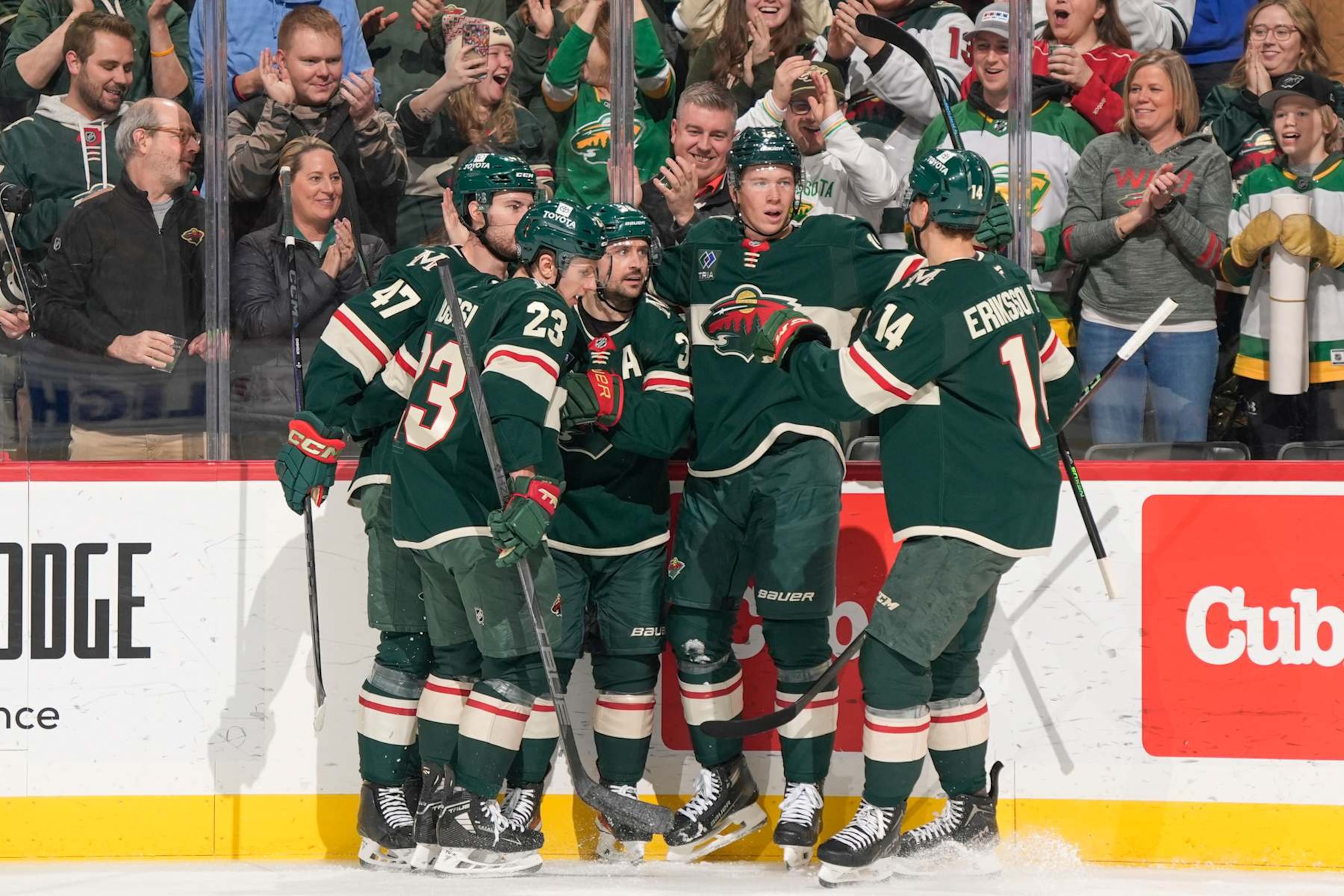 SAINT PAUL, MN - JANUARY 15: Matt Boldy #12 of the Minnesota Wild celebrates his goal with his teammates Joel Eriksson Ek #14, Mats Zuccarello #36, Marco Rossi #23 and Declan Chisholm #47 against the Edmonton Oilers during the game at the Xcel Energy Center on January 15, 2025 in Saint Paul, Minnesota. (Photo by Bruce Kluckhohn/NHLI via Getty Images)