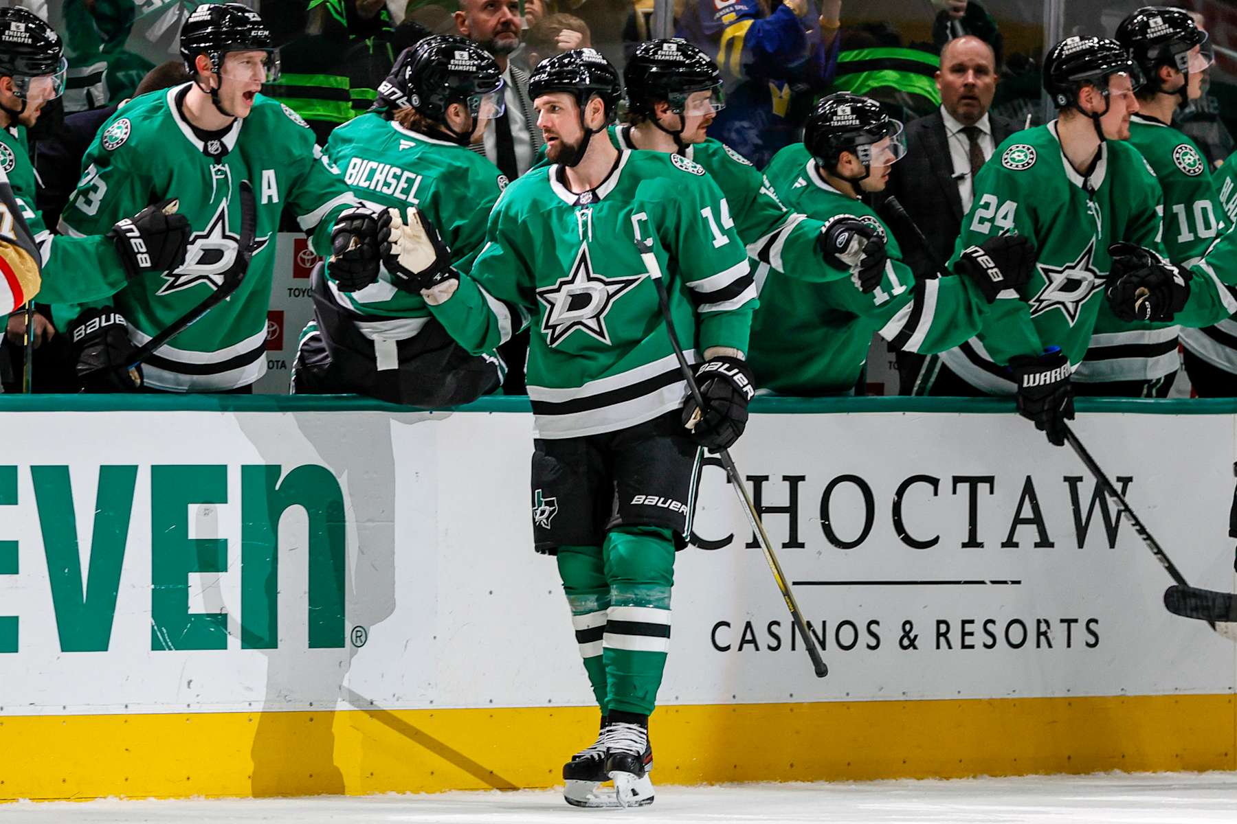 DALLAS, TX - JANUARY 24: Dallas Stars left wing Jamie Benn (14) gets high fives after a goal during the game between the Dallas Stars and the Vegas Golden Knights on January 24, 2025 at American Airlines Center in Dallas, Texas. (Photo by Matthew Pearce/Icon Sportswire via Getty Images)