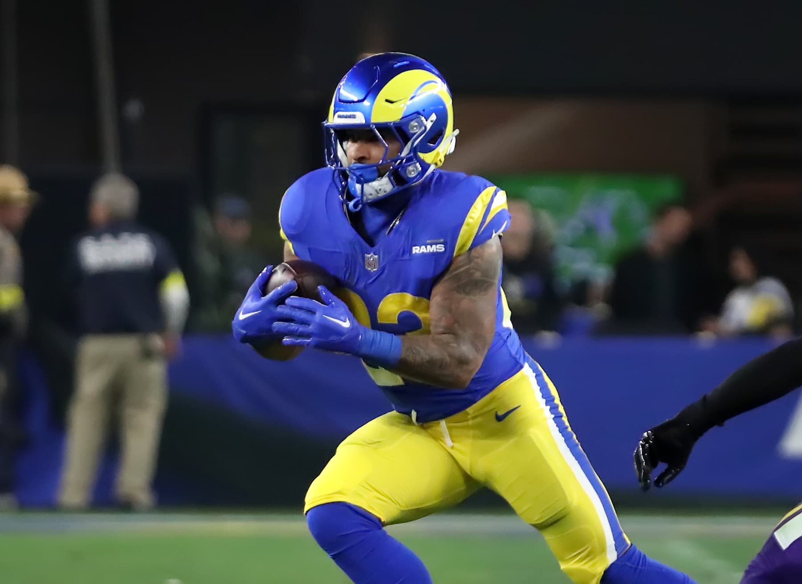 GLENDALE, ARIZONA - JANUARY 13: Runningback Kyren Williams #23 of the LA Rams rushes for positive yards during the first half of the Minnesota Vikings versus Los Angeles Rams NFL Wild Card football game at State Farm Stadium on January 13, 2025 in Glendale, Arizona. (Photo by Bruce Yeung/Getty Images) GLENDALE, ARIZONA - JANUARY 13: Runningback Kyren Williams #23 of the LA Rams rushes for positive yards during the first half of the Minnesota Vikings versus Los Angeles Rams NFL Wild Card football game at State Farm Stadium on January 13, 2025 in Glendale, Arizona. (Photo by Bruce Yeung/Getty Images)