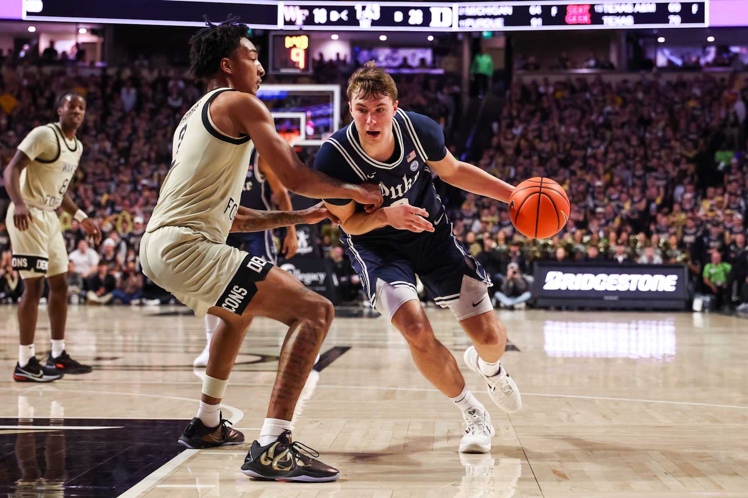WINSTON SALEM, NORTH CAROLINA - JANUARY 25: Cooper Flagg #2 of the Duke Blue Devils drives to the basket during the first half of a basketball game against the Wake Forest Demon Deacons at Lawrence Joel Veterans Memorial Coliseum on January 25, 2025 in Winston Salem, North Carolina. (Photo by David Jensen/Getty Images) WINSTON SALEM, NORTH CAROLINA - JANUARY 25: Cooper Flagg #2 of the Duke Blue Devils drives to the basket during the first half of a basketball game against the Wake Forest Demon Deacons at Lawrence Joel Veterans Memorial Coliseum on January 25, 2025 in Winston Salem, North Carolina. (Photo by David Jensen/Getty Images)