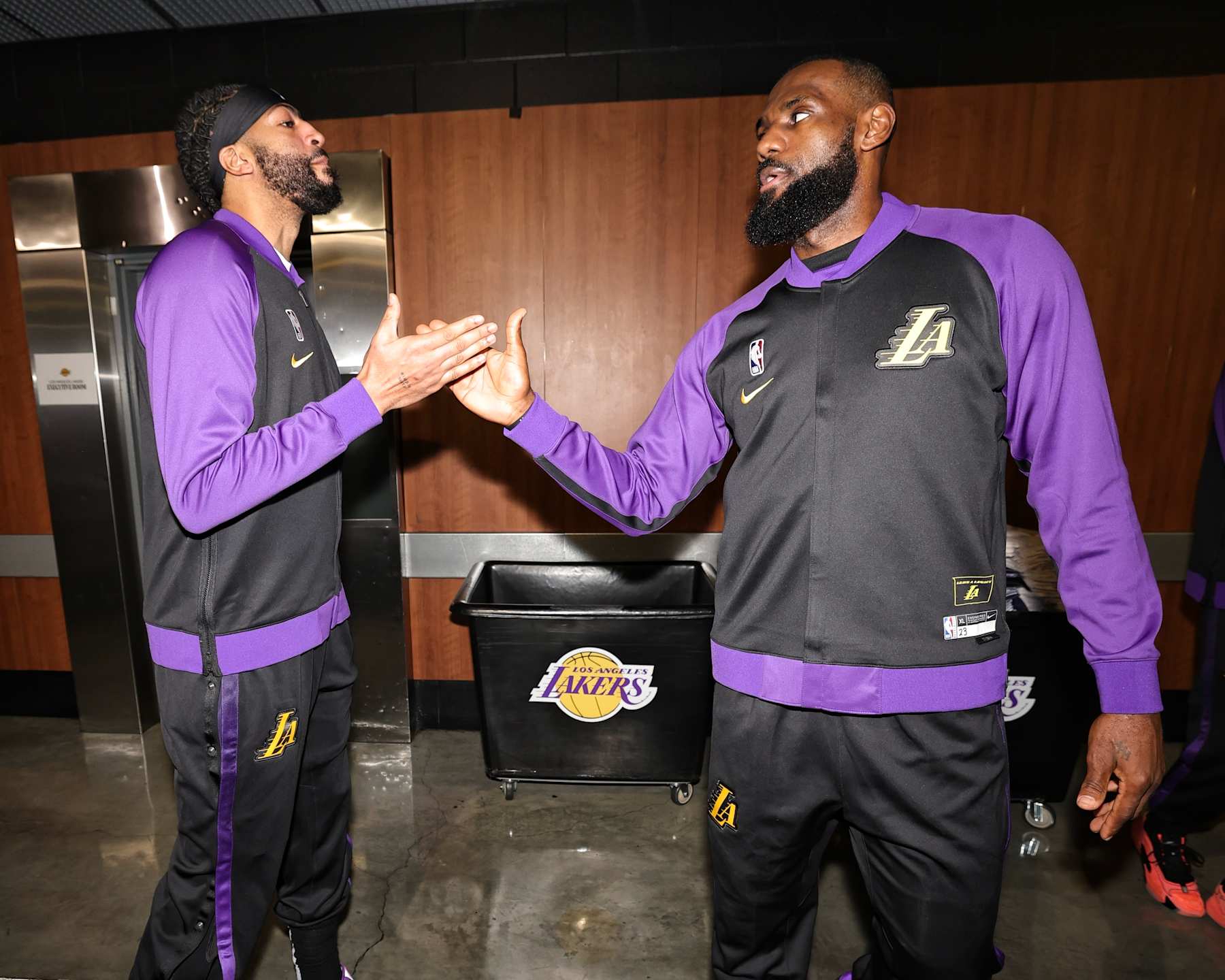 LOS ANGELES, CA - DECEMBER 23: LeBron James #23 of the Los Angeles Lakers embraces Anthony Davis #3 before the game against the Detroit Pistons on December 23, 2024 at Crypto.Com Arena in Los Angeles, California. NOTE TO USER: User expressly acknowledges and agrees that, by downloading and/or using this Photograph, user is consenting to the terms and conditions of the Getty Images License Agreement. Mandatory Copyright Notice: Copyright 2024 NBAE (Photo by Jim Poorten/NBAE via Getty Images)