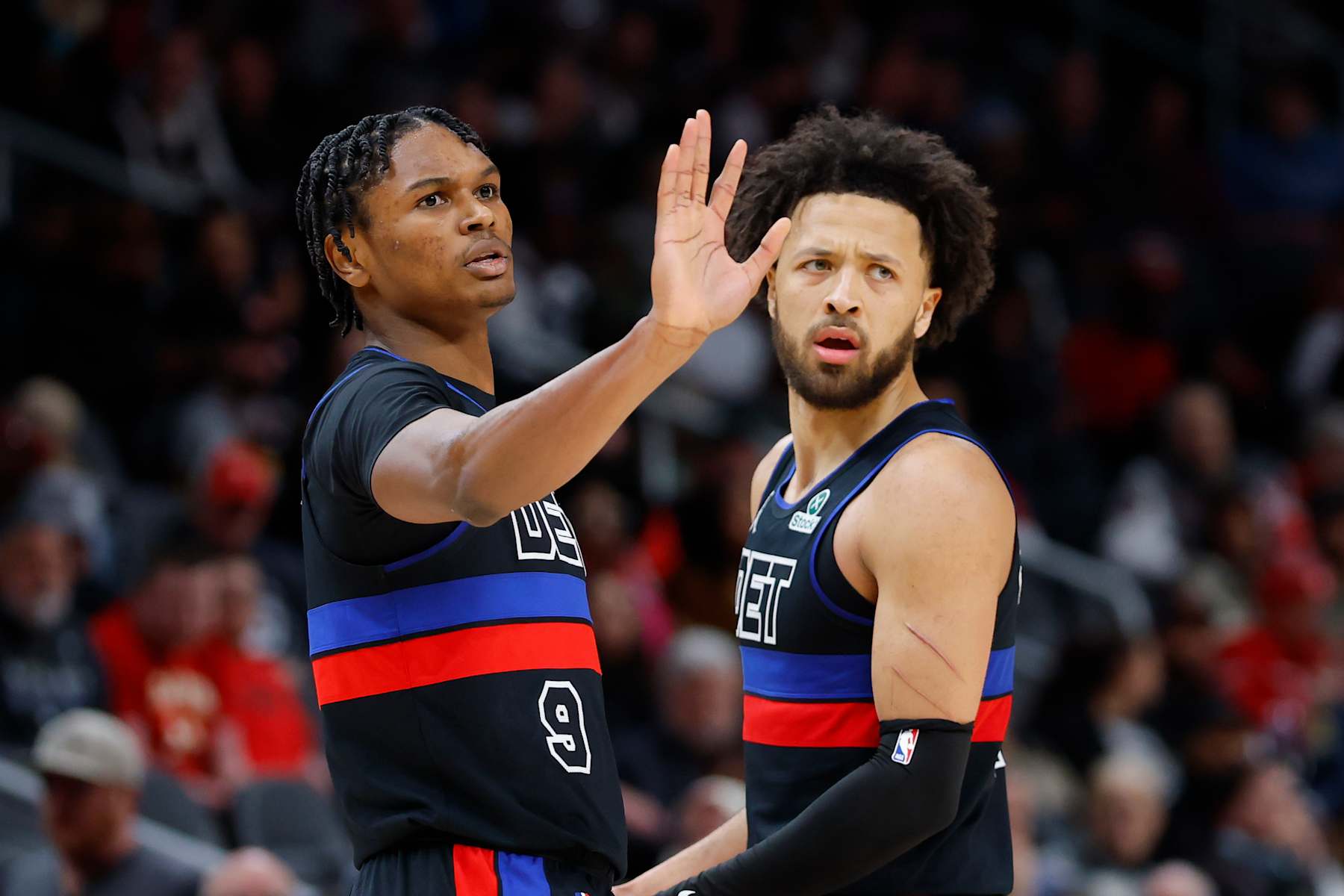 ATLANTA, GEORGIA - JANUARY 22: Ausar Thompson #9 and Cade Cunningham #2 of the Detroit Pistons react during the third quarter against the Atlanta Hawks at State Farm Arena on January 22, 2025 in Atlanta, Georgia. NOTE TO USER: User expressly acknowledges and agrees that, by downloading and or using this photograph, User is consenting to the terms and conditions of the Getty Images License Agreement. (Photo by Todd Kirkland/Getty Images)