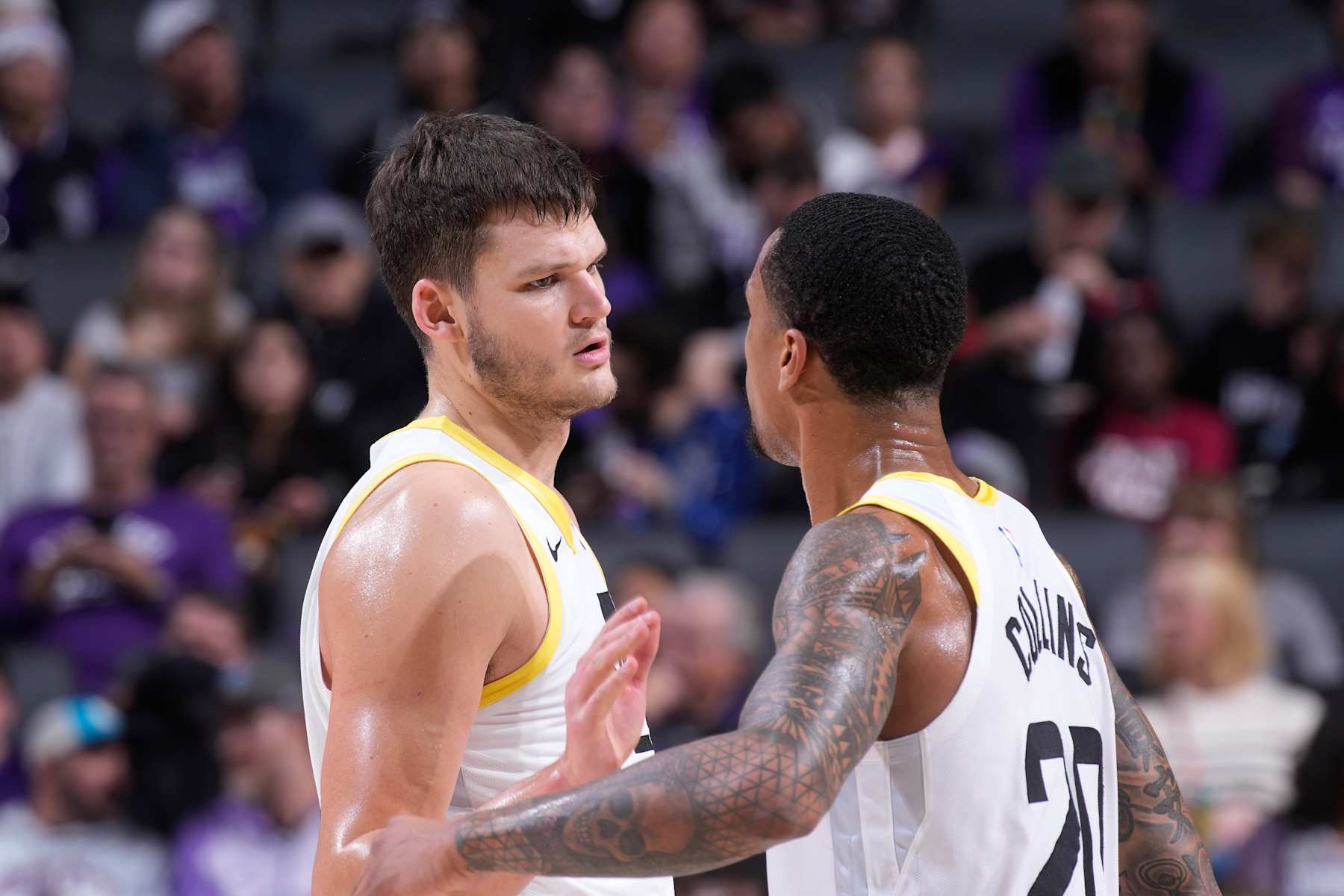 SACRAMENTO, CA - DECEMBER 8: Walker Kessler #24 and John Collins #20 of the Utah Jazz talk during the game against the Sacramento Kings on December 8, 2024 at Golden 1 Center in Sacramento, California. NOTE TO USER: User expressly acknowledges and agrees that, by downloading and or using this photograph, User is consenting to the terms and conditions of the Getty Images Agreement. Mandatory Copyright Notice: Copyright 2024 NBAE (Photo by Rocky Widner/NBAE via Getty Images)