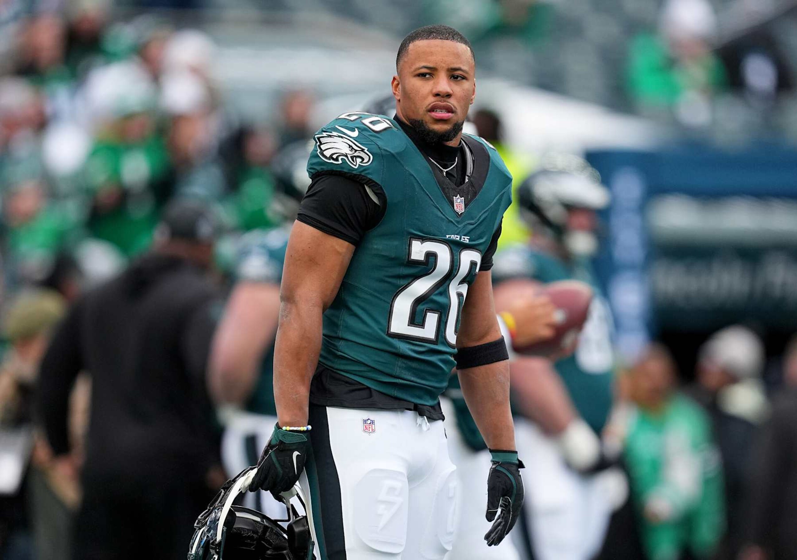 PHILADELPHIA, PENNSYLVANIA - JANUARY 26: Saquon Barkley #26 of the Philadelphia Eagles looks on prior to the NFC Championship Game against the Washington Commanders at Lincoln Financial Field on January 26, 2025 in Philadelphia, Pennsylvania. (Photo by Mitchell Leff/Getty Images) PHILADELPHIA, PENNSYLVANIA - JANUARY 26: Saquon Barkley #26 of the Philadelphia Eagles looks on prior to the NFC Championship Game against the Washington Commanders at Lincoln Financial Field on January 26, 2025 in Philadelphia, Pennsylvania. (Photo by Mitchell Leff/Getty Images)