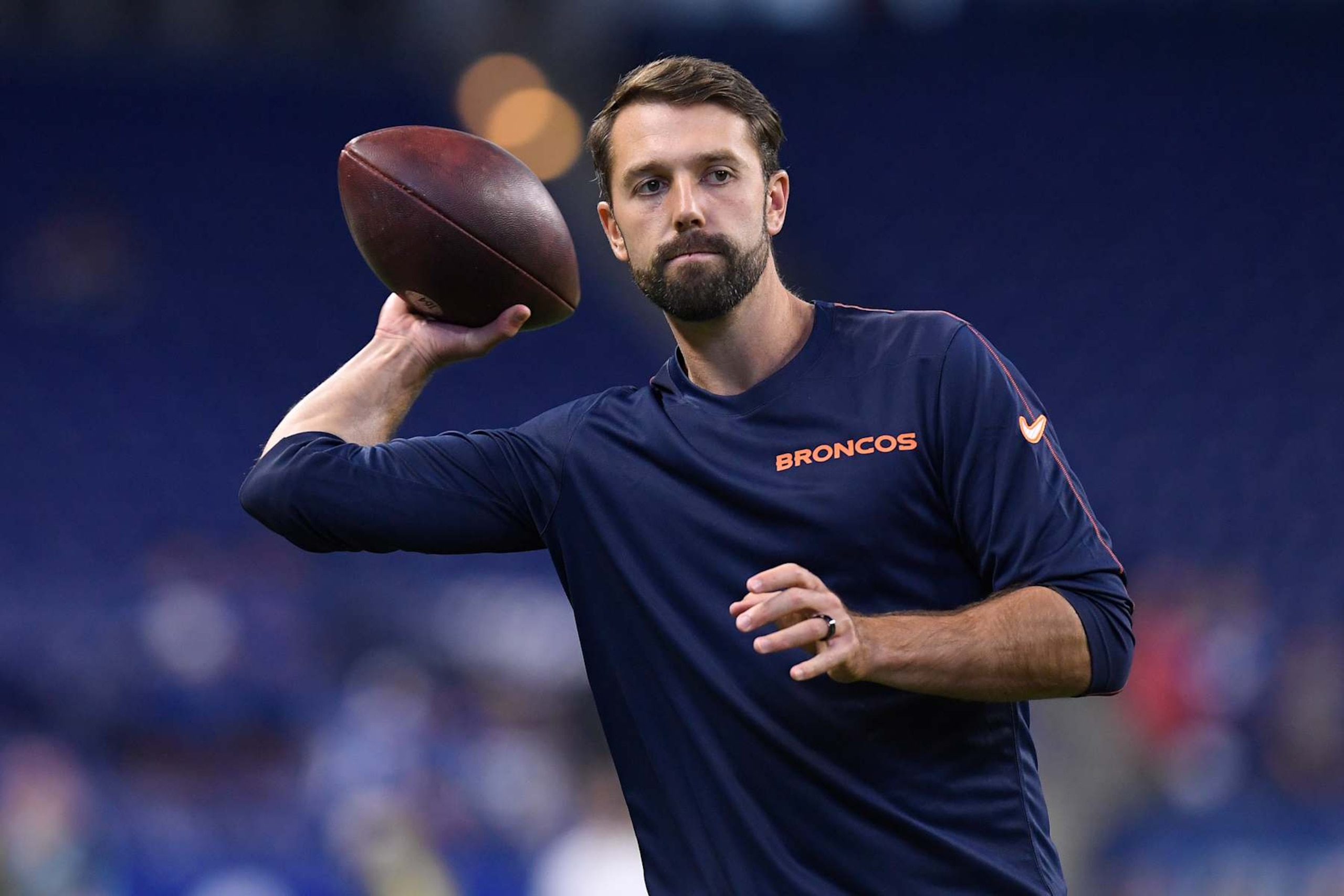 INDIANAPOLIS, IN - AUGUST 11: Denver Broncos Tight Ends Coach Declan Doyle passes to players before the NFL Preseason game between the Denver Broncos and the Indianapolis Colts on August 11, 2024, at Lucas Oil Stadium in Indianapolis, Indiana. (Photo by Michael Allio/Icon Sportswire via Getty Images)