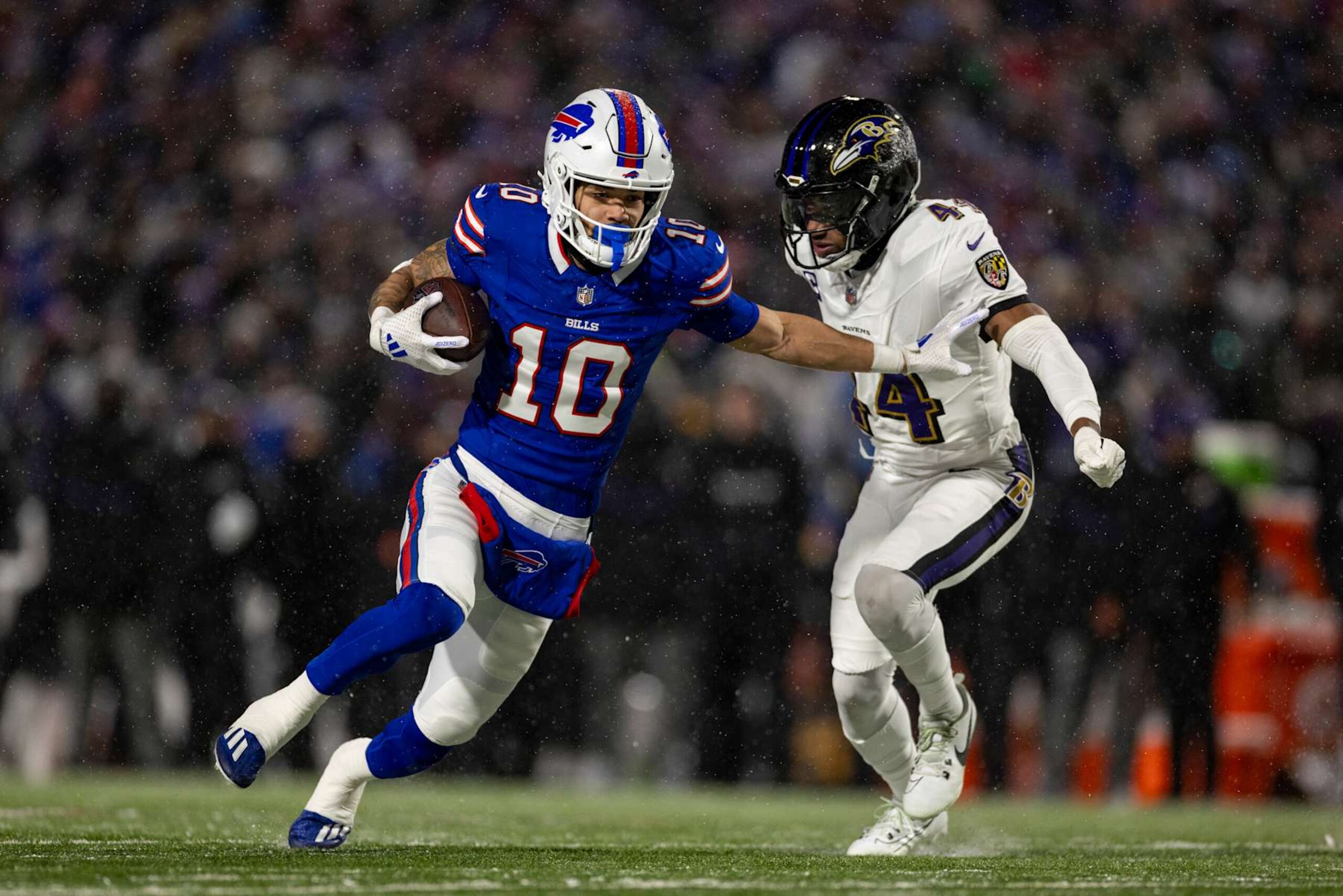 ORCHARD PARK, NEW YORK - JANUARY 19: Khalil Shakir #10 of the Buffalo Bills runs with the ball against Marlon Humphrey #44 of the Baltimore Ravens during an NFL Football game at Highmark Stadium on January 19, 2025 in Orchard Park, New York. (Photo by Michael Owens/Getty Images) ORCHARD PARK, NEW YORK - JANUARY 19: Khalil Shakir #10 of the Buffalo Bills runs with the ball against Marlon Humphrey #44 of the Baltimore Ravens during an NFL Football game at Highmark Stadium on January 19, 2025 in Orchard Park, New York. (Photo by Michael Owens/Getty Images)