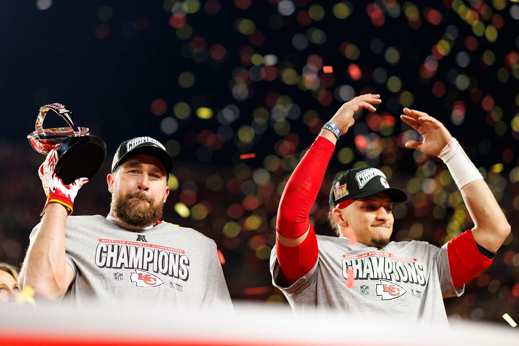 KANSAS CITY, MISSOURI - JANUARY 26: Tight end Travis Kelce #87 of the Kansas City Chiefs celebrates on the podium after the AFC Championship football game against the Buffalo Bills, at GEHA Field at Arrowhead Stadium on January 26, 2025 in Kansas City, Missouri. (Photo by Brooke Sutton/Getty Images)