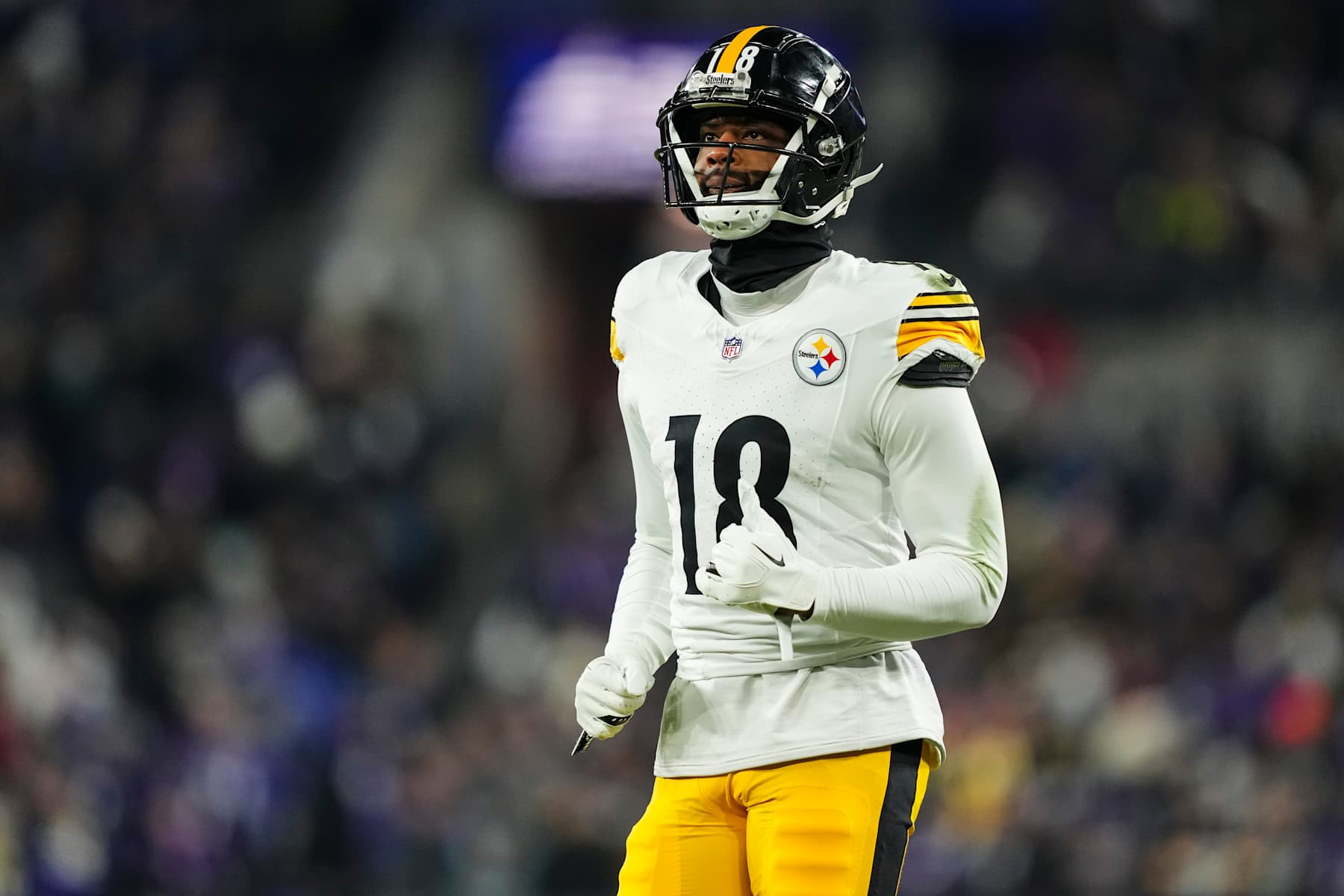 BALTIMORE, MD - JANUARY 11: Mike Williams #18 of the Pittsburgh Steelers runs across the field during an NFL football wild card playoff game against the Baltimore Ravens at M&T Bank Stadium on January 11, 2025 in Baltimore, Maryland. (Photo by Cooper Neill/Getty Images)