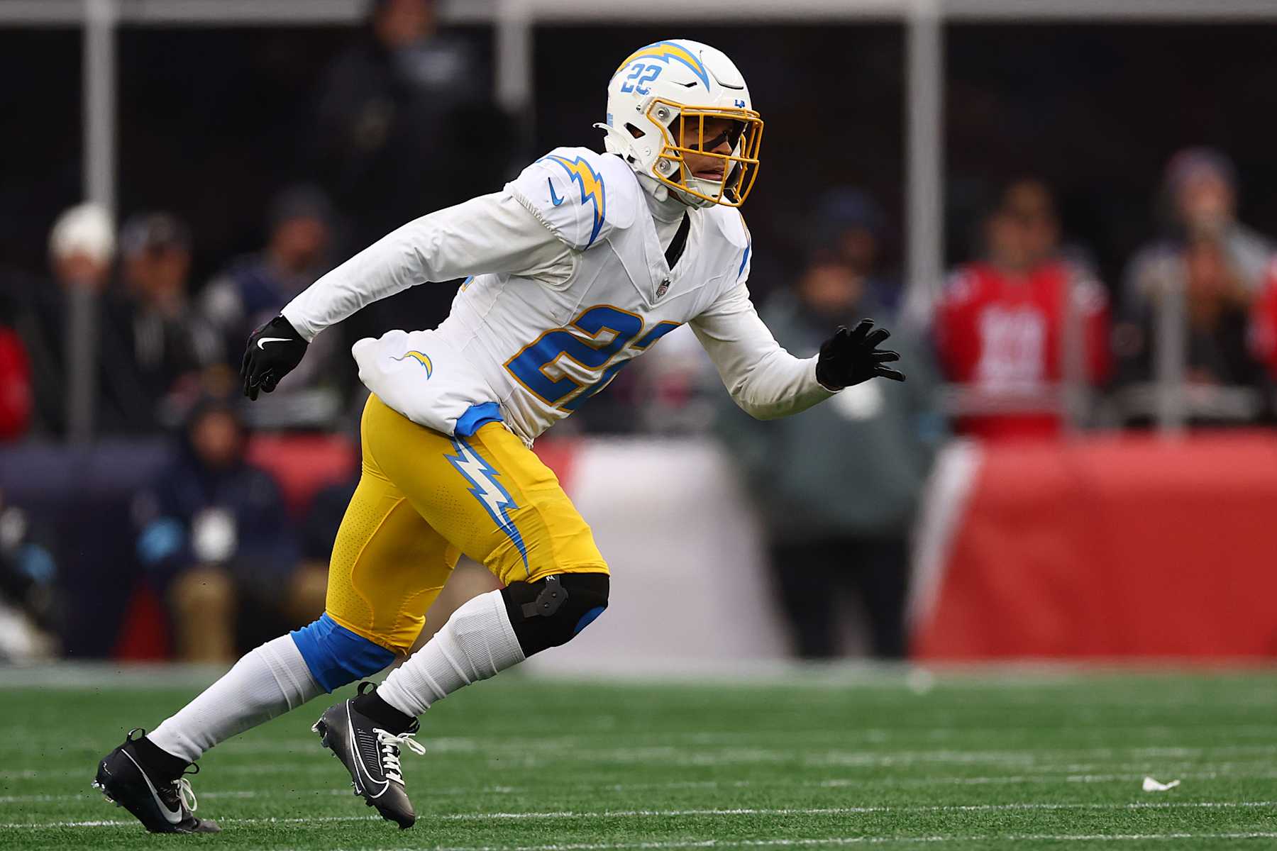FOXBOROUGH, MASSACHUSETTS - DECEMBER 28: Elijah Molden #22 of the Los Angeles Chargers runs downfield during the game against the New England Patriots  at Gillette Stadium on December 28, 2024 in Foxborough, Massachusetts. (Photo by Maddie Meyer/Getty Images)