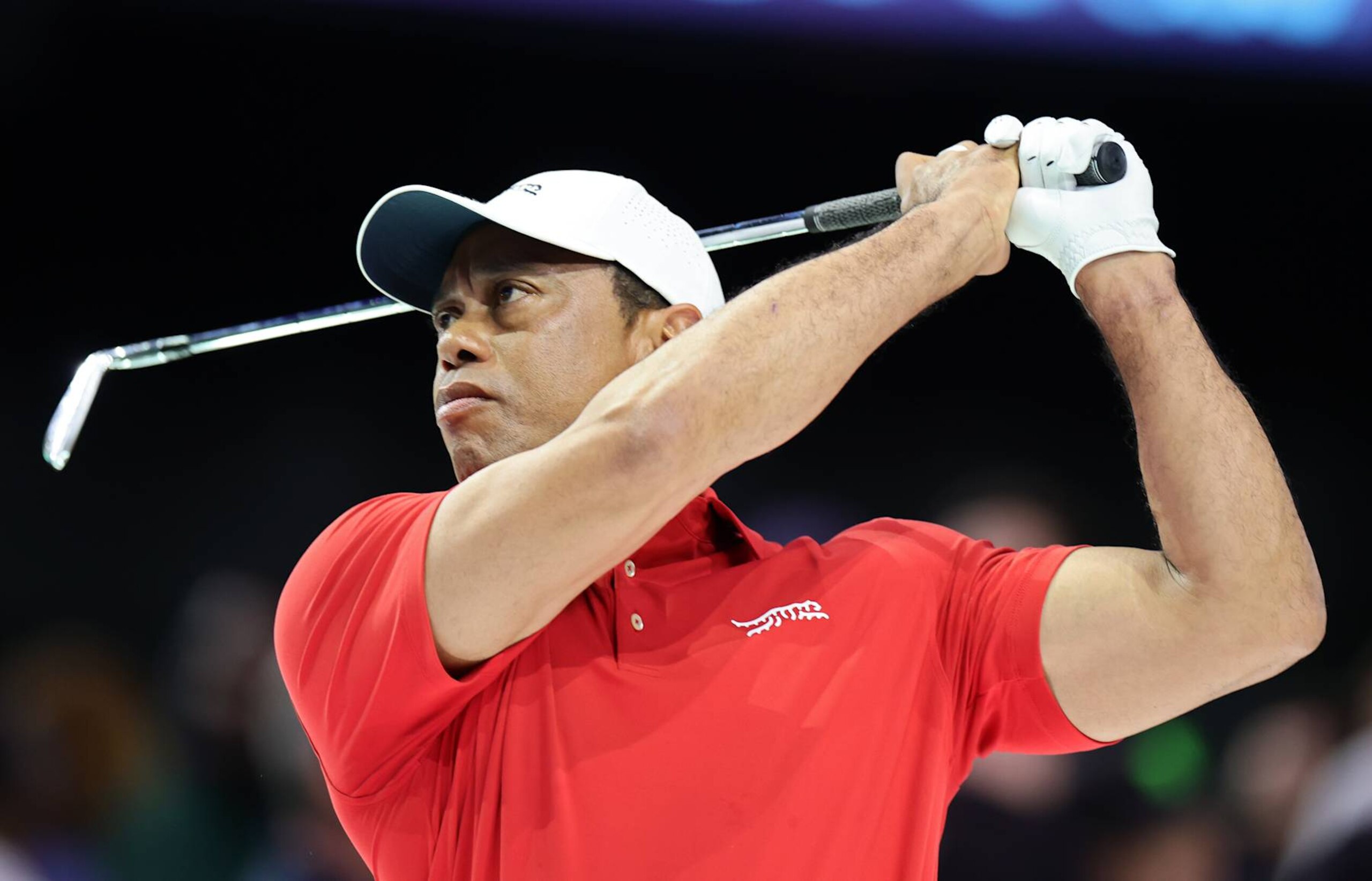 PALM BEACH GARDENS, FLORIDA - JANUARY 27: Tiger Woods of Jupiter Links Golf Club warms up before their TGL presented by SoFi match against the Boston Common Golf at SoFi Center on January 27, 2025 in Palm Beach Gardens, Florida. (Photo by Carmen Mandato/TGL/TGL via Getty Images) PALM BEACH GARDENS, FLORIDA - JANUARY 27: Tiger Woods of Jupiter Links Golf Club warms up before their TGL presented by SoFi match against the Boston Common Golf at SoFi Center on January 27, 2025 in Palm Beach Gardens, Florida. (Photo by Carmen Mandato/TGL/TGL via Getty Images)