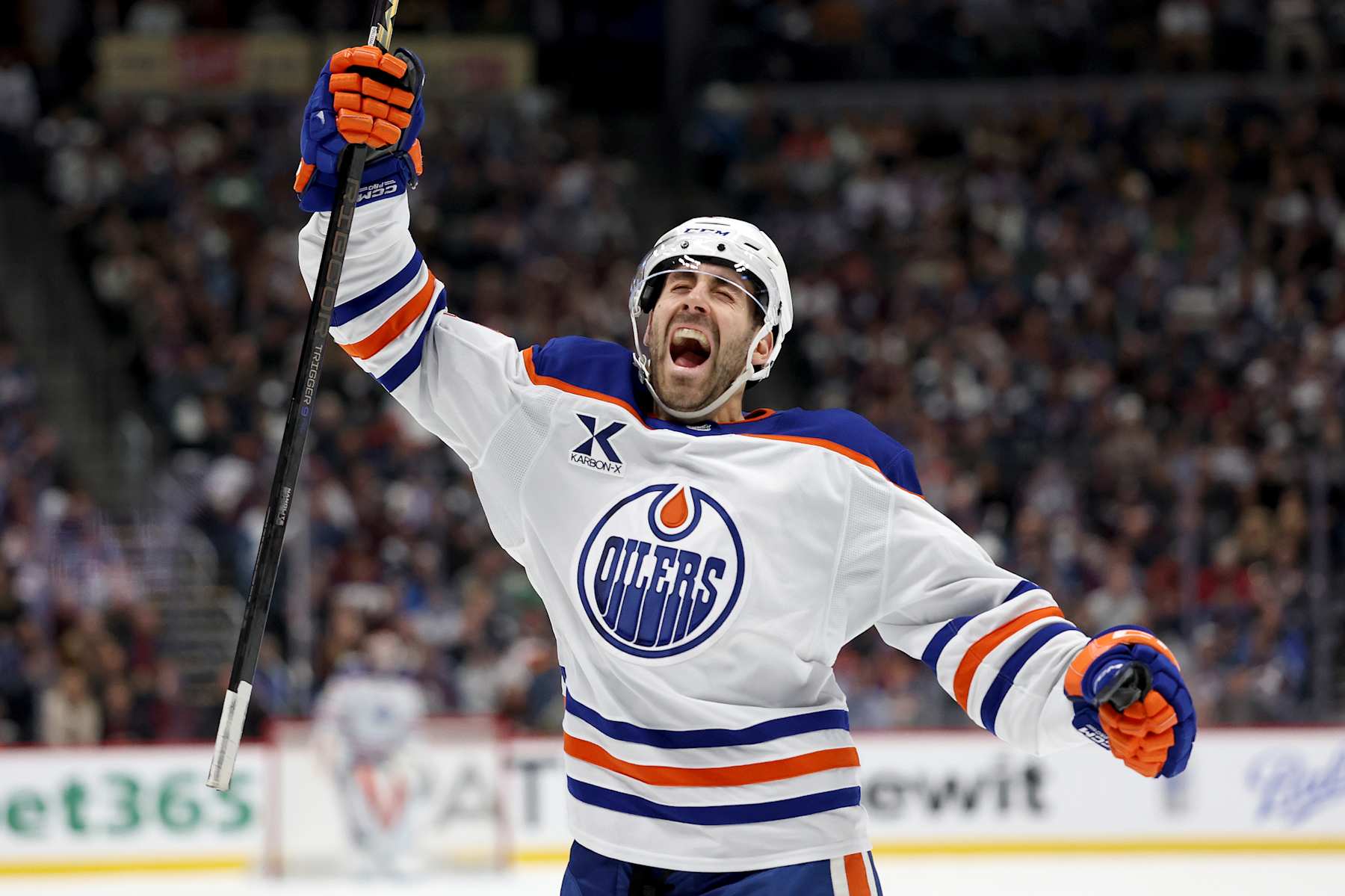 DENVER, COLORADO - JANUARY 16:  Evan Bouchard #2 of the Edmonton Oilers celebrates scoring the winning goal against the Colorado Avalanche in the third period at Ball Arena on January 16, 2025 in Denver, Colorado. (Photo by Matthew Stockman/Getty Images)