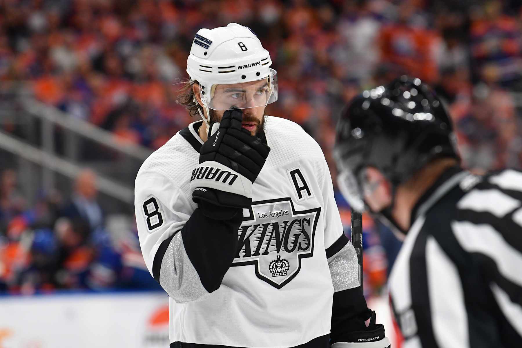 EDMONTON, CANADA - MAY 01: Drew Doughty #8 of the Los Angeles Kings wipes his cheek in Game Five of the First Round of the 2024 Stanley Cup Playoffs against the Edmonton Oilers at Rogers Place on May 1, 2024, in Edmonton, Alberta, Canada. (Photo by Andy Devlin/NHLI via Getty Images)