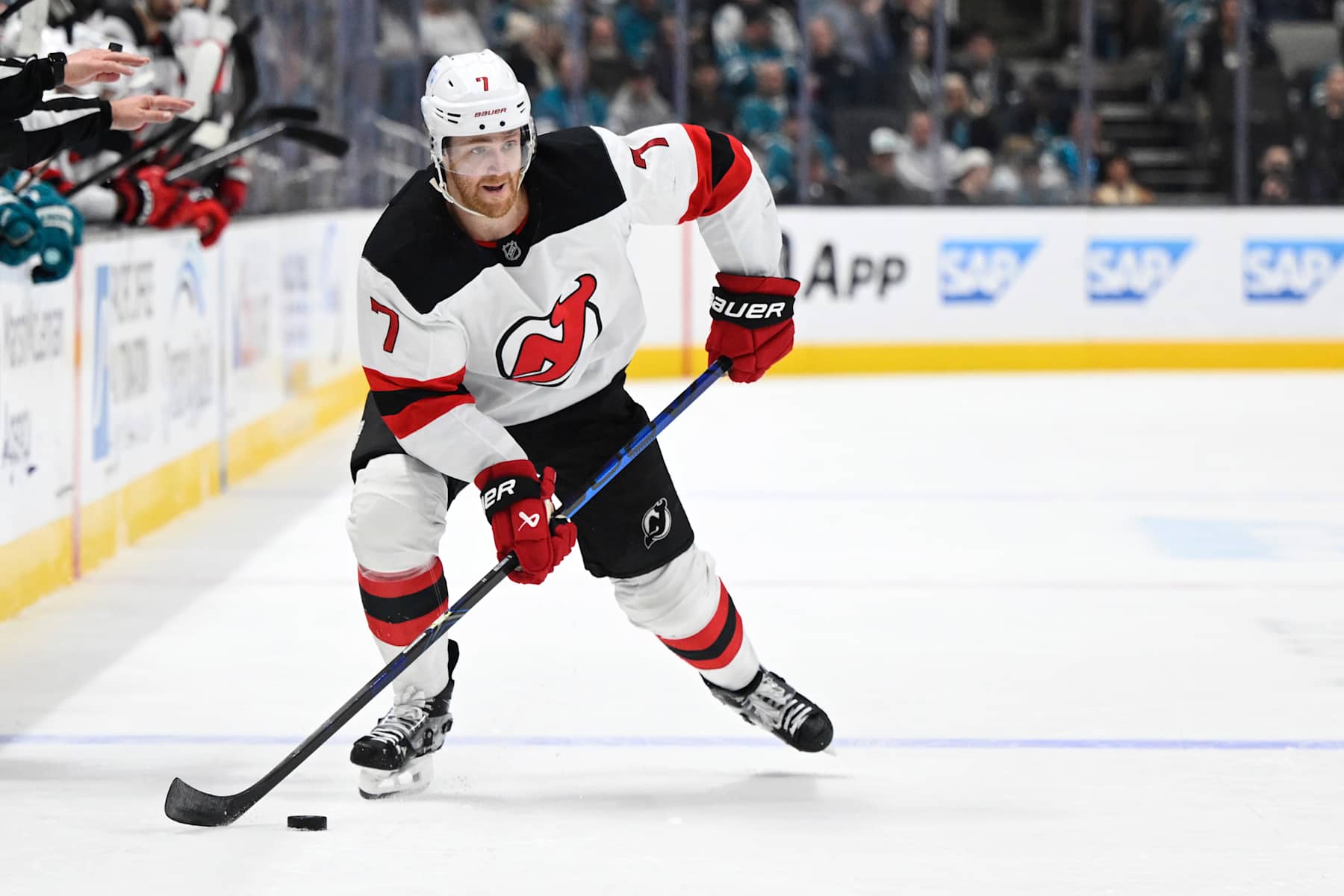 SAN JOSE, CALIFORNIA - JANUARY 04: Dougie Hamilton #7 of the New Jersey Devils controls the puck against the San Jose Sharks in the third period at SAP Center on January 04, 2025 in San Jose, California. (Photo by Eakin Howard/Getty Images)