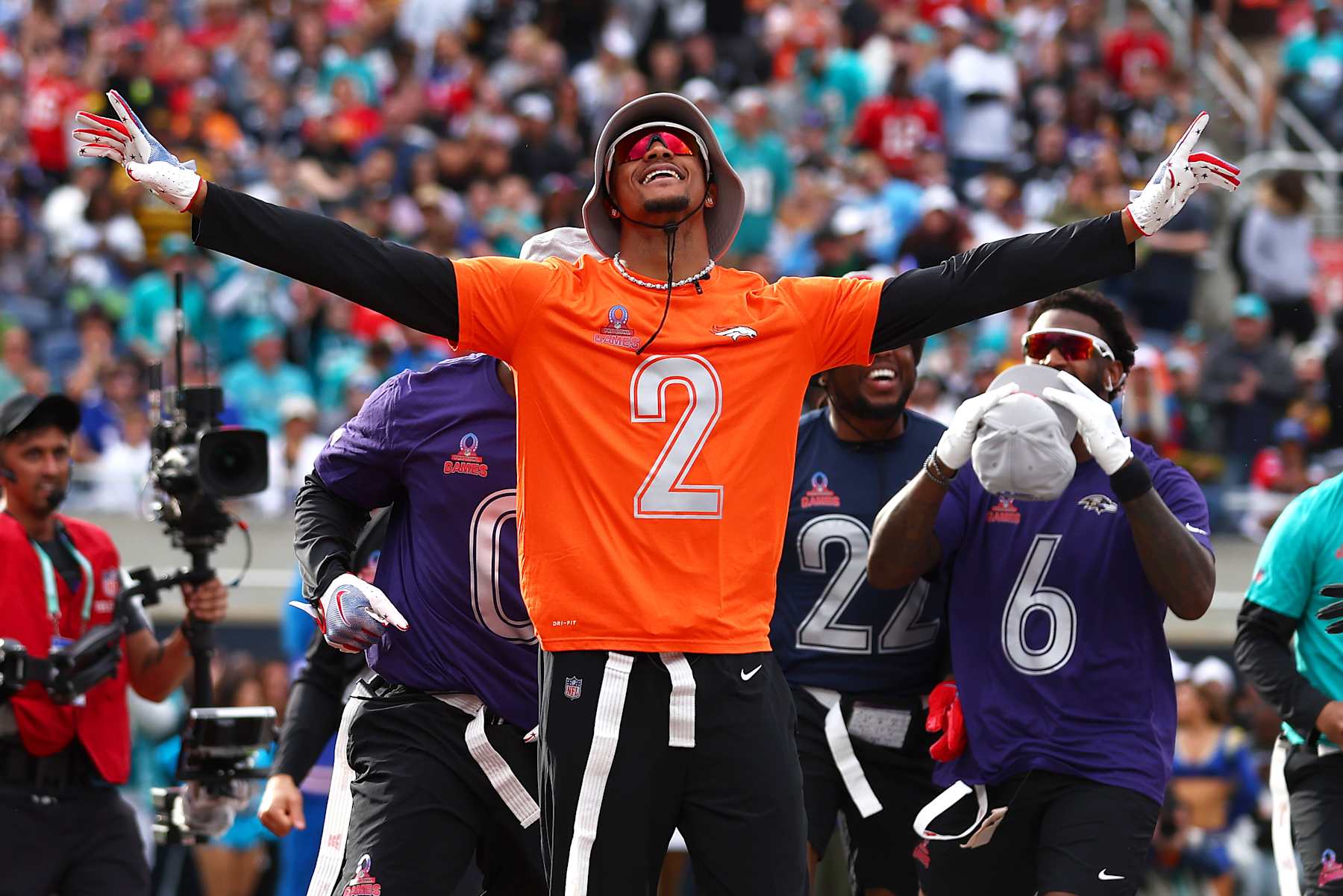 ORLANDO, FLORIDA - FEBRUARY 04: Pat Surtain II #2 of the Denver Broncos and AFC celebrates after returning  an interception for a touchdown during the first half of the 2024 NFL Pro Bowl Games at Camping World Stadium on February 04, 2024 in Orlando, Florida. (Photo by Megan Briggs/Getty Images)