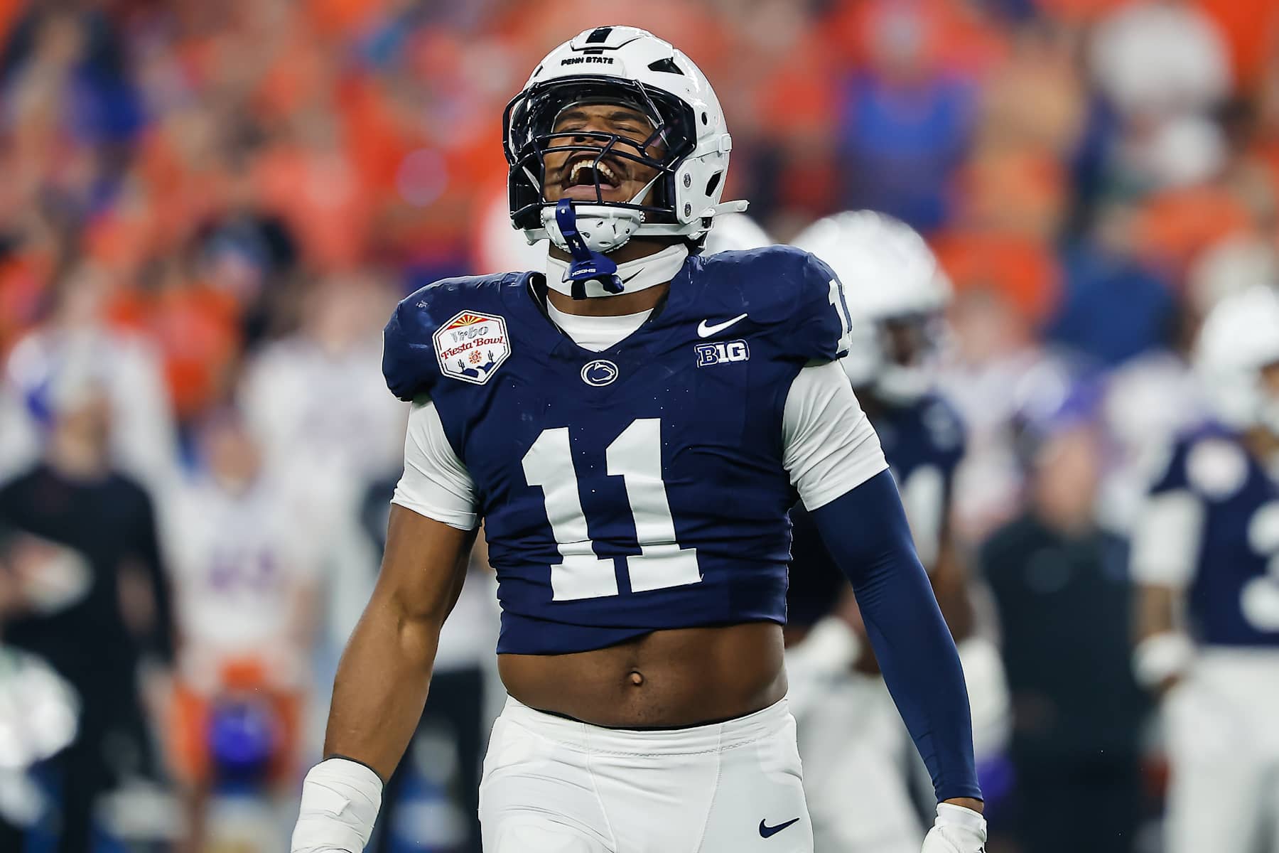 GLENDALE, AZ - DECEMBER 31:  Defensive End Abdul Carter #11 of the Penn State Nittany Lions reacts after a big play during the Penn State Nittany Lions versus Boise State Broncos College Football Playoff Quarterfinal at the Vrbo Fiesta Bowl on December 31,2024, at State Farm Stadium in Glendale, AZ.  (Photo by Kevin Abele/Icon Sportswire via Getty Images)