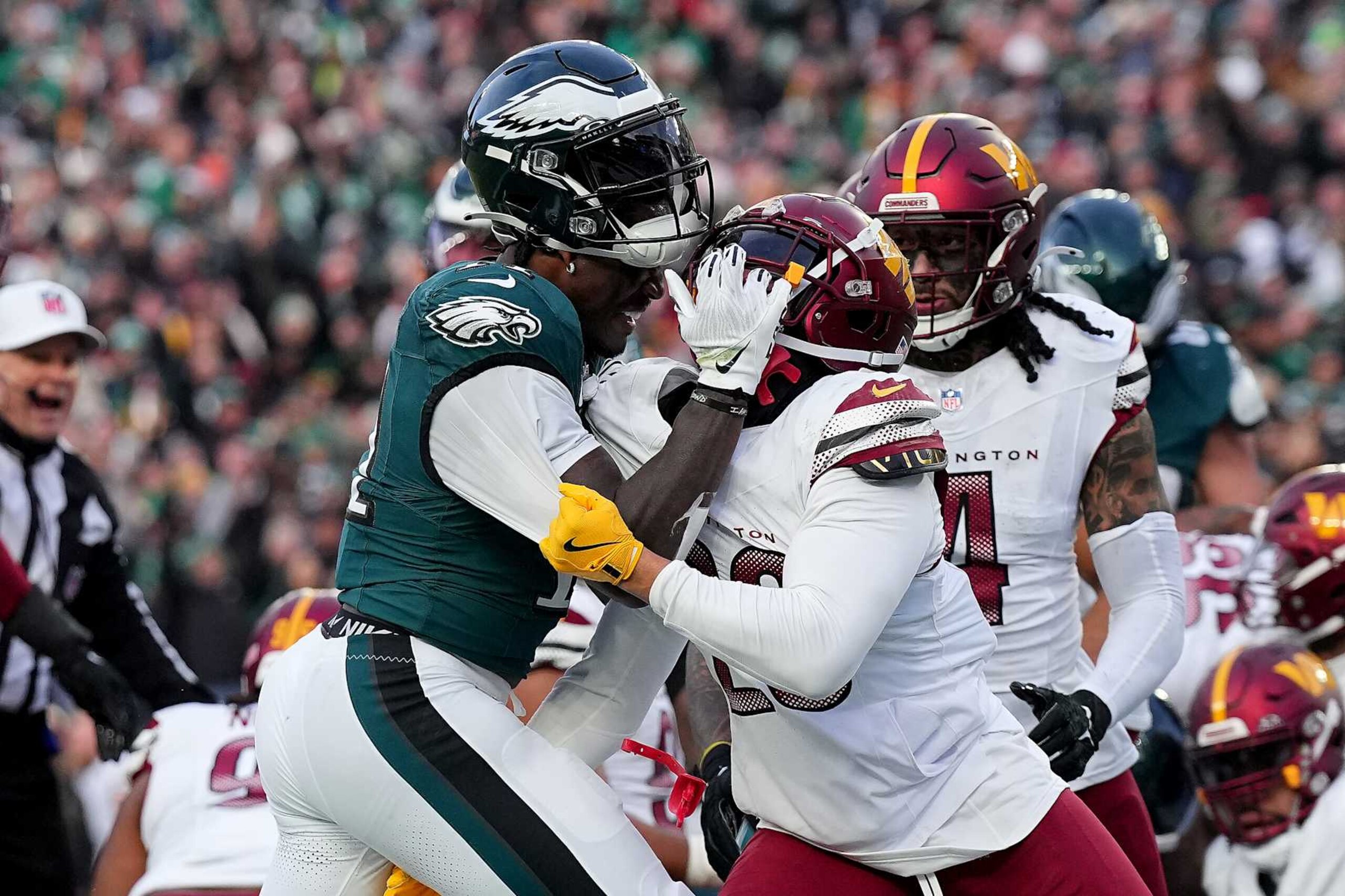 PHILADELPHIA, PENNSYLVANIA - JANUARY 26: A.J. Brown #11 of the Philadelphia Eagles and Marshon Lattimore #23 of the Washington Commanders get into an altercation during the second quarter in the NFC Championship Game at Lincoln Financial Field on January 26, 2025 in Philadelphia, Pennsylvania. (Photo by Mitchell Leff/Getty Images) PHILADELPHIA, PENNSYLVANIA - JANUARY 26: A.J. Brown #11 of the Philadelphia Eagles and Marshon Lattimore #23 of the Washington Commanders get into an altercation during the second quarter in the NFC Championship Game at Lincoln Financial Field on January 26, 2025 in Philadelphia, Pennsylvania. (Photo by Mitchell Leff/Getty Images)