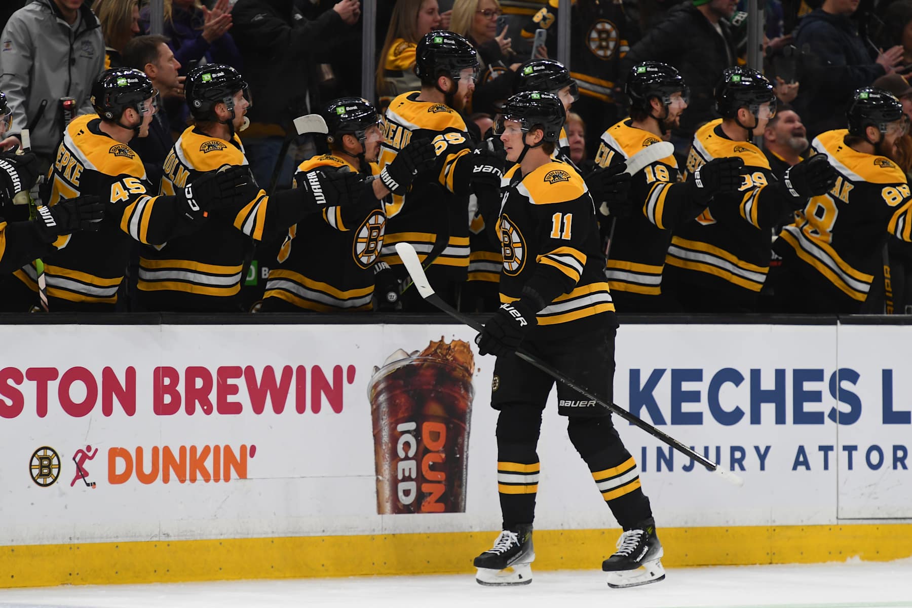 BOSTON, MASSACHUSETTS - JANUARY 14: Trent Frederic #11 of the Boston Bruins celebrates his first-period goal against the Tampa Bay Lightning on January 14, 2025, at the TD Garden in Boston, Massachusetts. (Photo by Steve Babineau/NHLI via Getty Images)