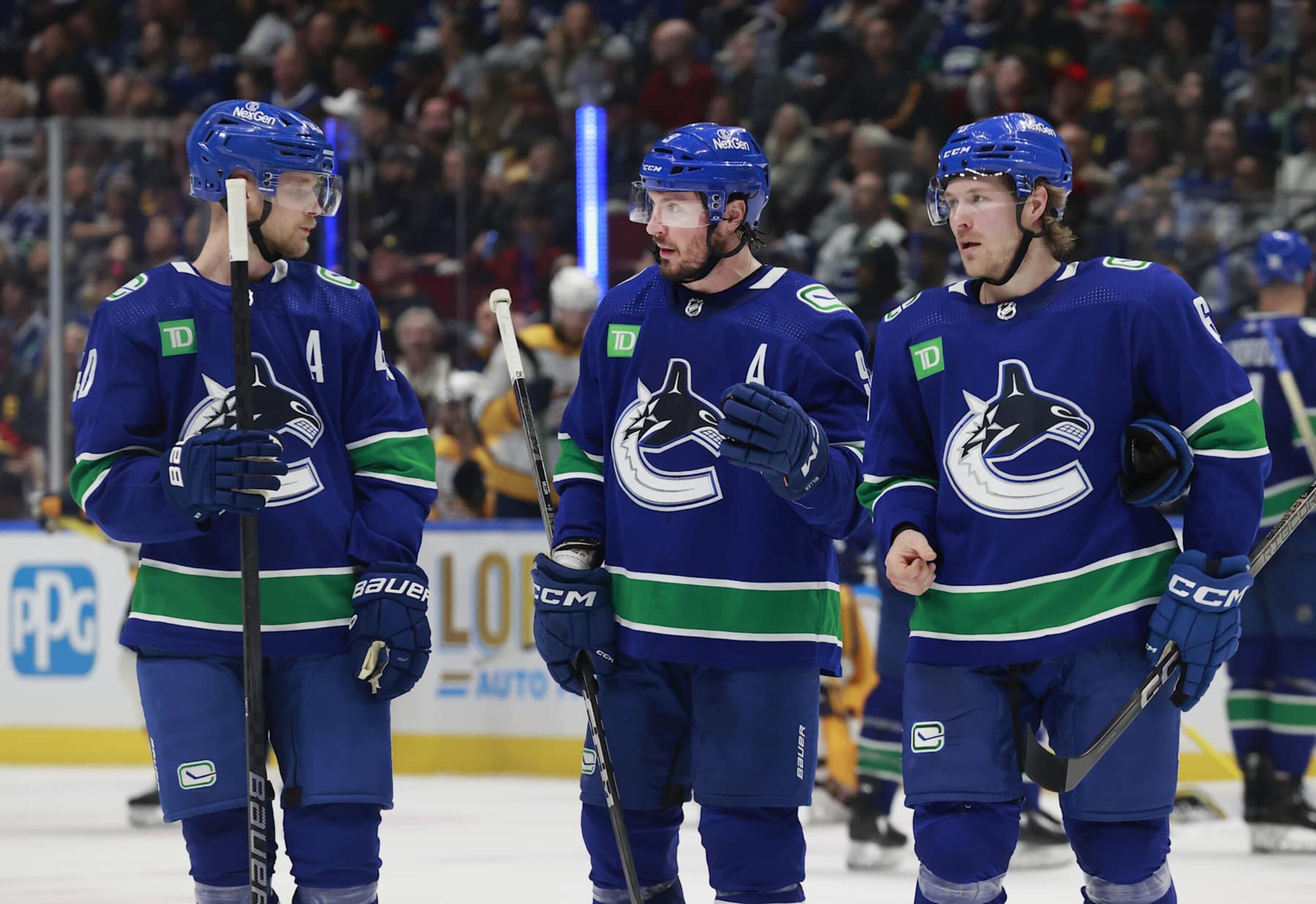 Elias Pettersson, J.T. Miller and Brock Boeser. Elias Pettersson, J.T. Miller and Brock Boeser.