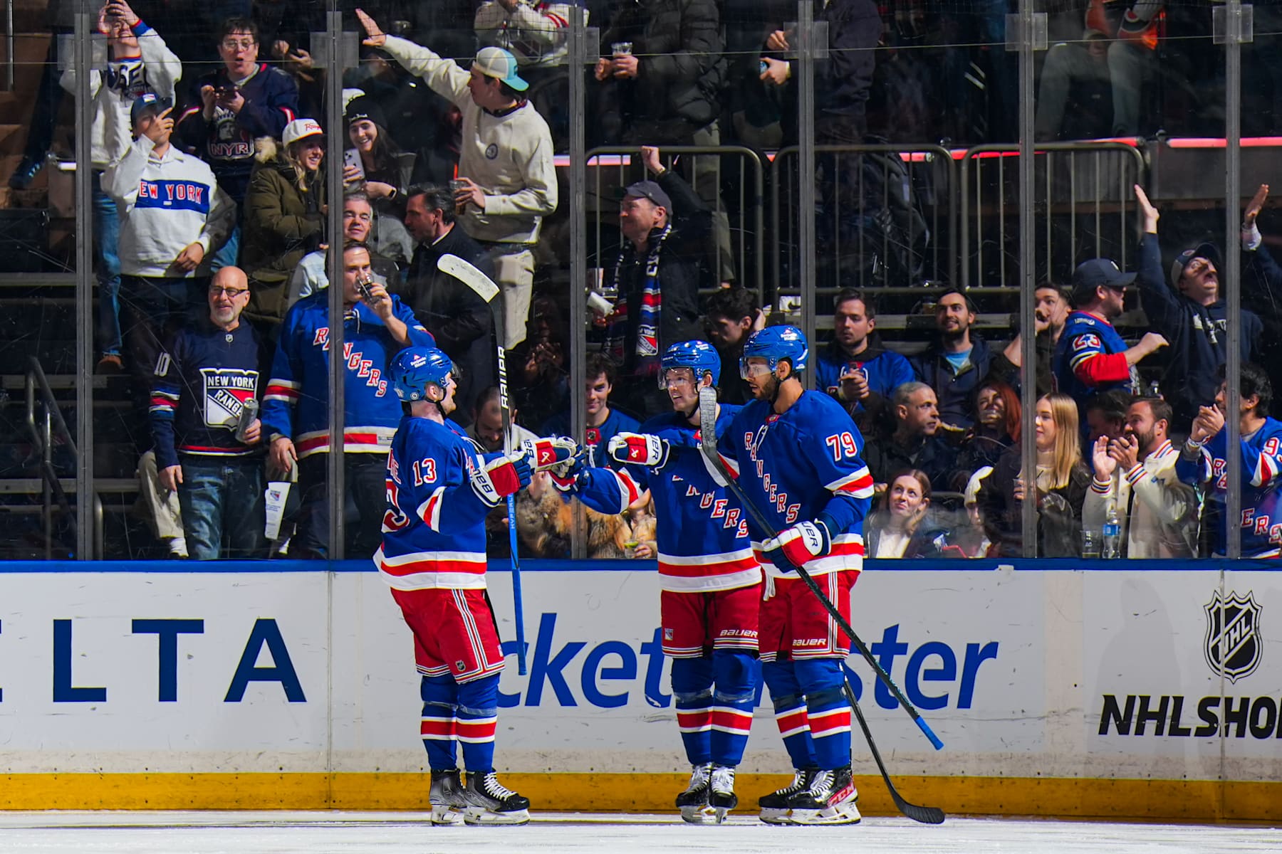 NEW YORK, NEW YORK - JANUARY 23:  K'Andre Miller #79 of the New York Rangers celebrates with teammates after scoring a goal in the second period against the Philadelphia Flyers at Madison Square Garden on January 23, 2025 in New York City. (Photo by Jared Silber/NHLI via Getty Images)