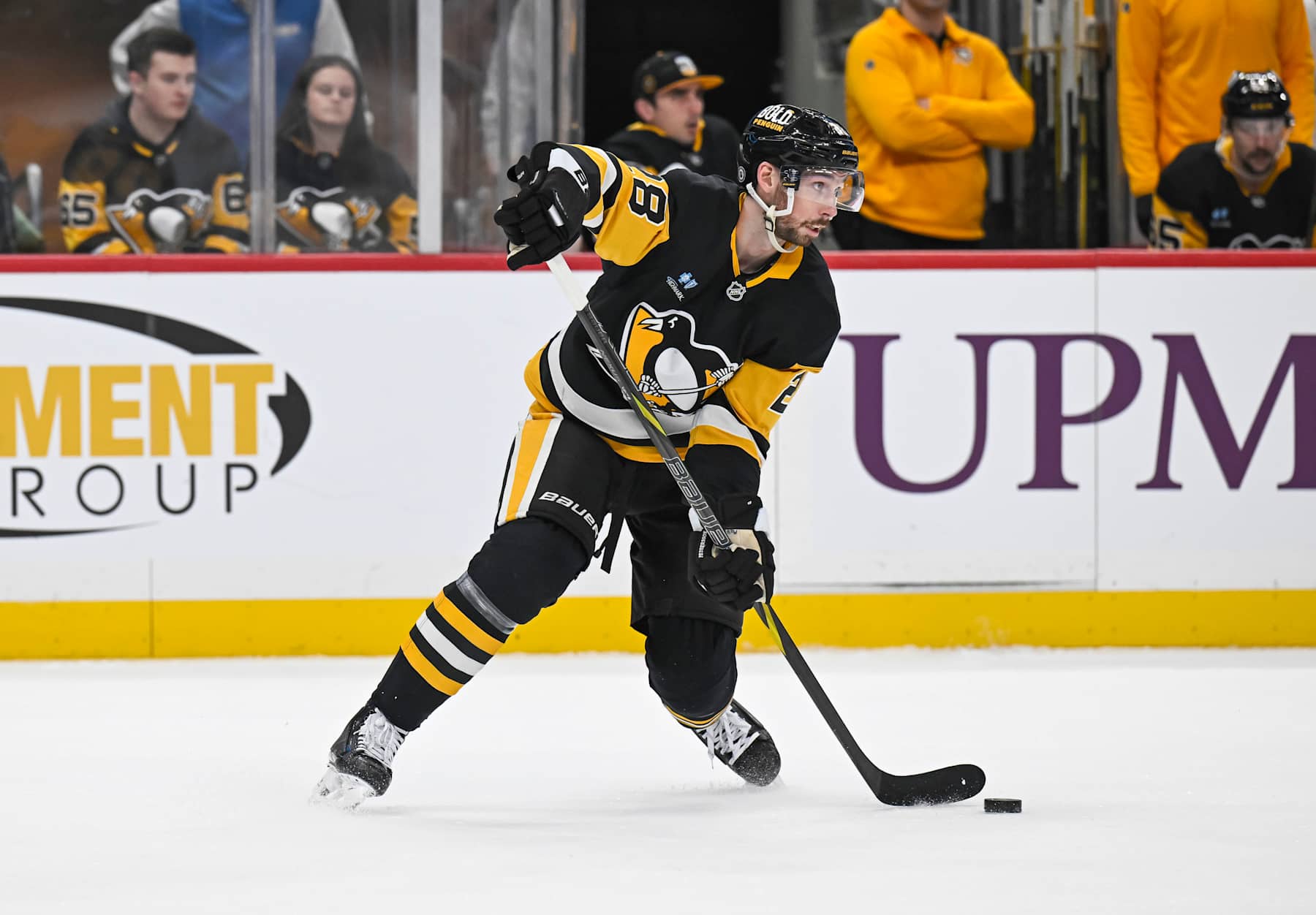 PITTSBURGH, PA - JANUARY 12: Pittsburgh Penguins defenseman Marcus Pettersson (28) passes the puck during the first period in the NHL game between the Pittsburgh Penguins and the Tampa Bay Lightning on January 12, 2025, at PPG Paints Arena in Pittsburgh, PA. (Photo by Jeanine Leech/Icon Sportswire via Getty Images)