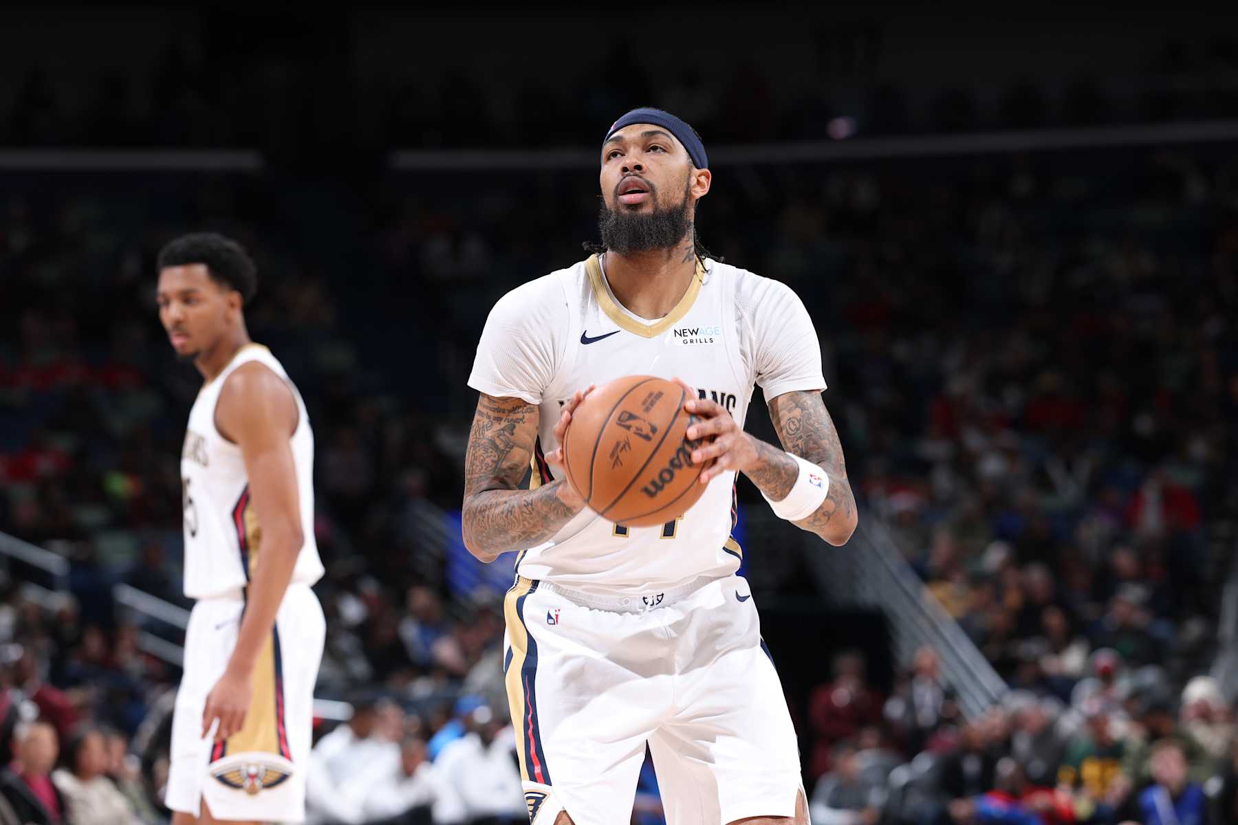 NEW ORLEANS, LA - DECEMBER 7:  Brandon Ingram #14 of the New Orleans Pelicans prepares to shoot a free throw during the game against the Oklahoma City Thunder  during a regular season game on December 7, 2024 at United Center in Chicago, Illinois. NOTE TO USER: User expressly acknowledges and agrees that, by downloading and or using this photograph, User is consenting to the terms and conditions of the Getty Images License Agreement. Mandatory Copyright Notice: Copyright 2024 NBAE (Photo by Jeff Haynes/NBAE via Getty Images)