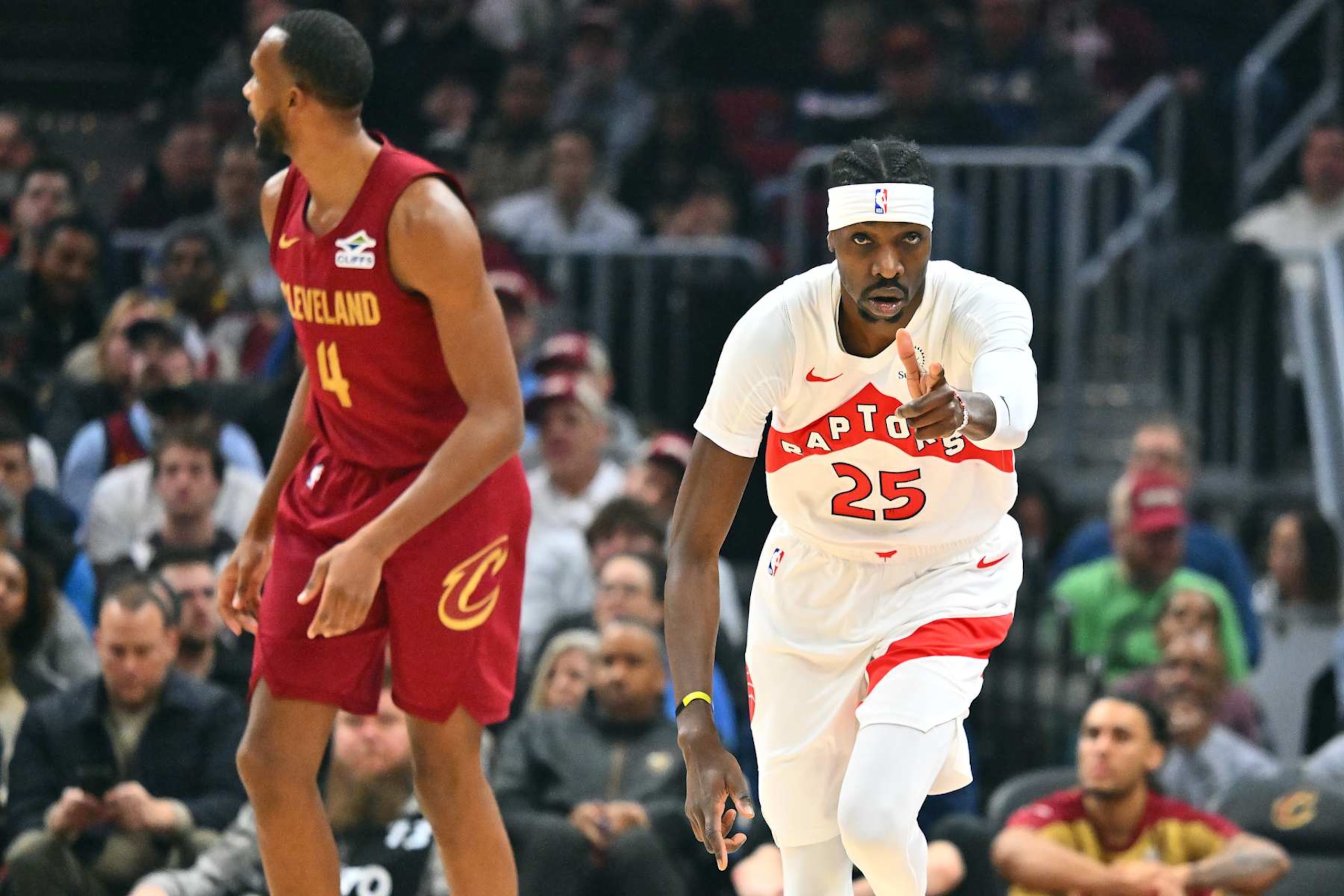 CLEVELAND, OHIO - JANUARY 09: Chris Boucher #25 of the Toronto Raptors celebrates after scoring during the first quarter against the Cleveland Cavaliers at Rocket Mortgage Fieldhouse on January 09, 2025 in Cleveland, Ohio. NOTE TO USER: User expressly acknowledges and agrees that, by downloading and or using this photograph, User is consenting to the terms and conditions of the Getty Images License Agreement. (Photo by Jason Miller/Getty Images)