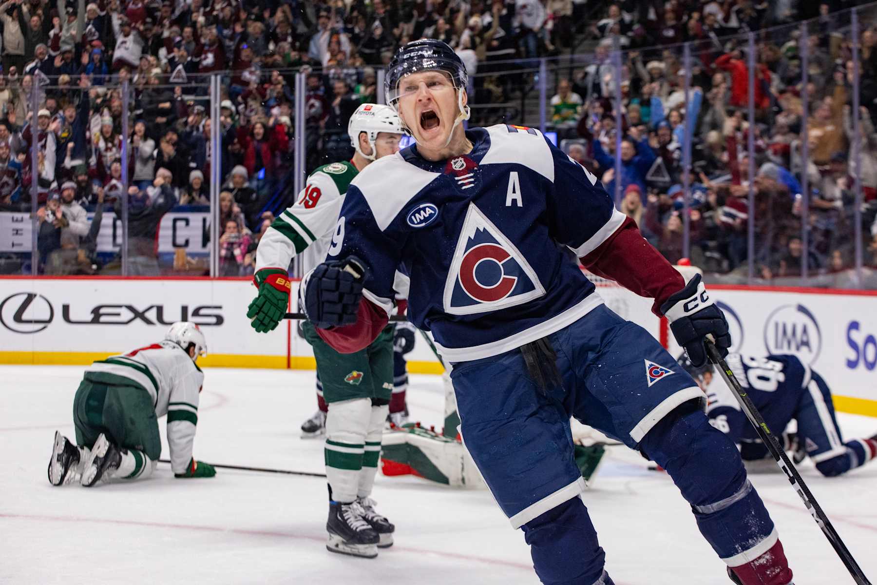 DENVER, COLORADO - JANUARY 20: Nathan MacKinnon #29 of the Colorado Avalanche celebrates after scoring a goal in the second period of the game against the Minnesota Wild at Ball Arena on January 20, 2025 in Denver, Colorado. (Photo by Ashley Potts/NHLI via Getty Images)