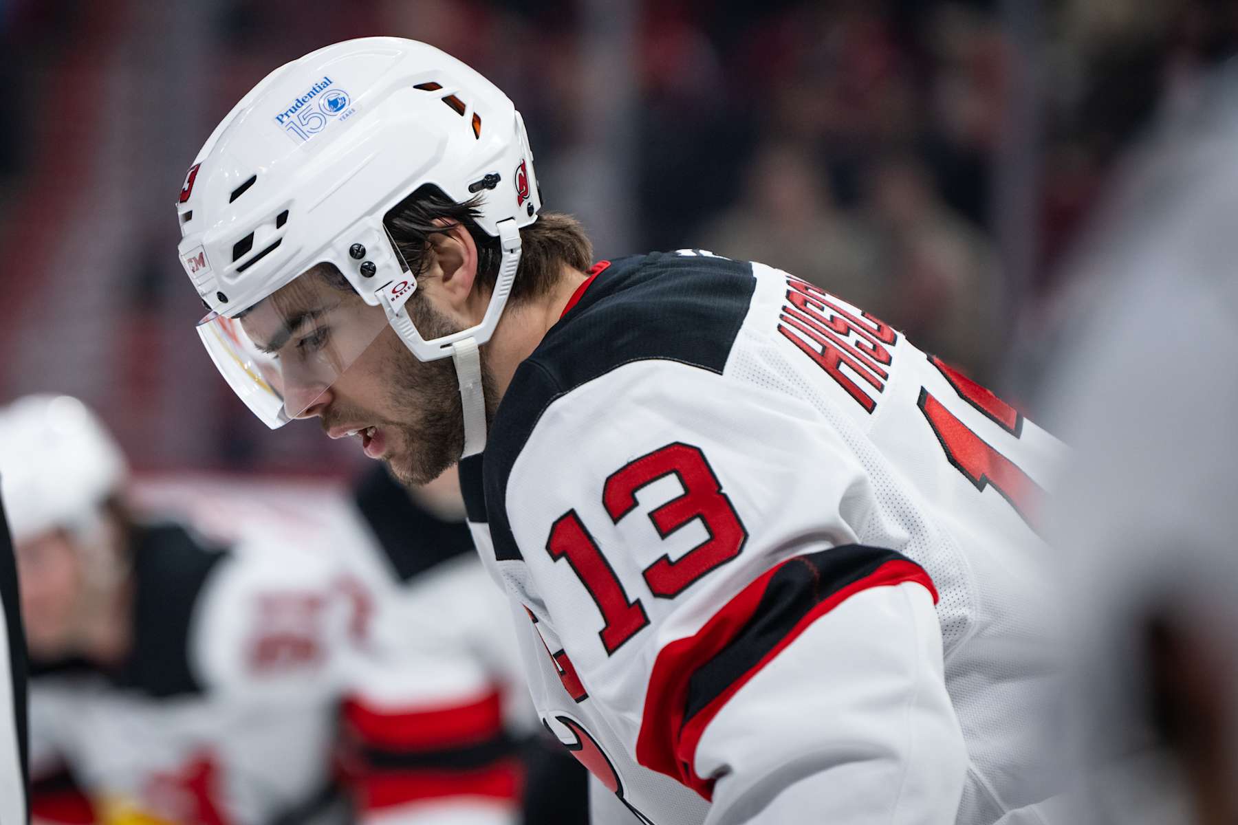 MONTREAL, QC - JANUARY 25: Nico Hischier (13) of the New Jersey Devils lines up for a face off  during the first period of the NHL game between the New Jersey Devils and the Montreal Canadiens on Jan 25 2025, at the Bell Centre in Montreal, QC(Photo by Vincent Ethier/Icon Sportswire via Getty Images)