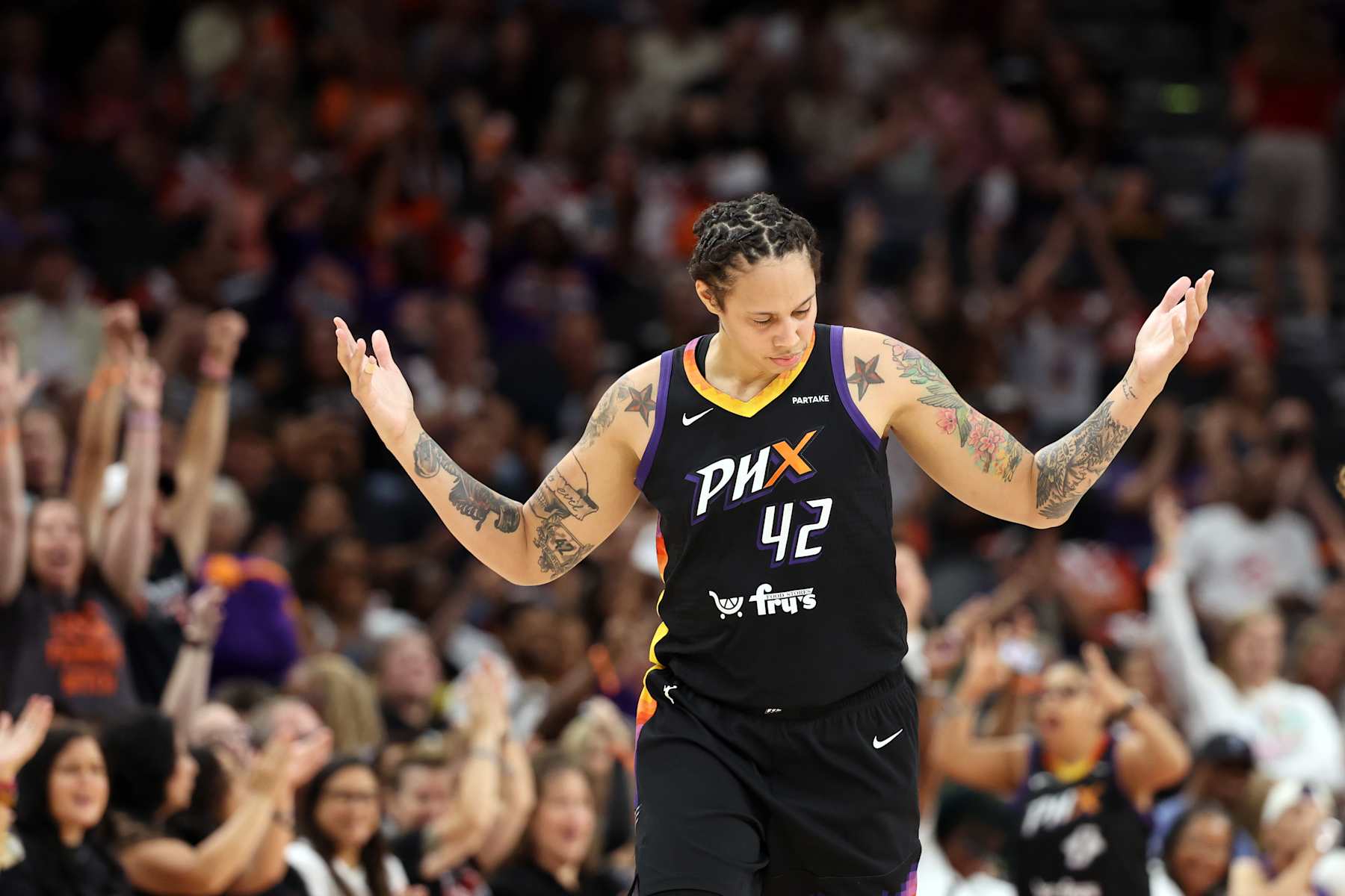 PHOENIX, ARIZONA - SEPTEMBER 13: Brittney Griner #42 of the Phoenix Mercury reacts after hitting a three point shot during the game against the Connecticut Sun at Footprint Center on September 13, 2024 in Phoenix, Arizona. The Sun defeated the Mercury 88-69. NOTE TO USER: User expressly acknowledges and agrees that, by downloading and or using this photograph, User is consenting to the terms and conditions of the Getty Images License Agreement.  (Photo by Chris Coduto/Getty Images)
