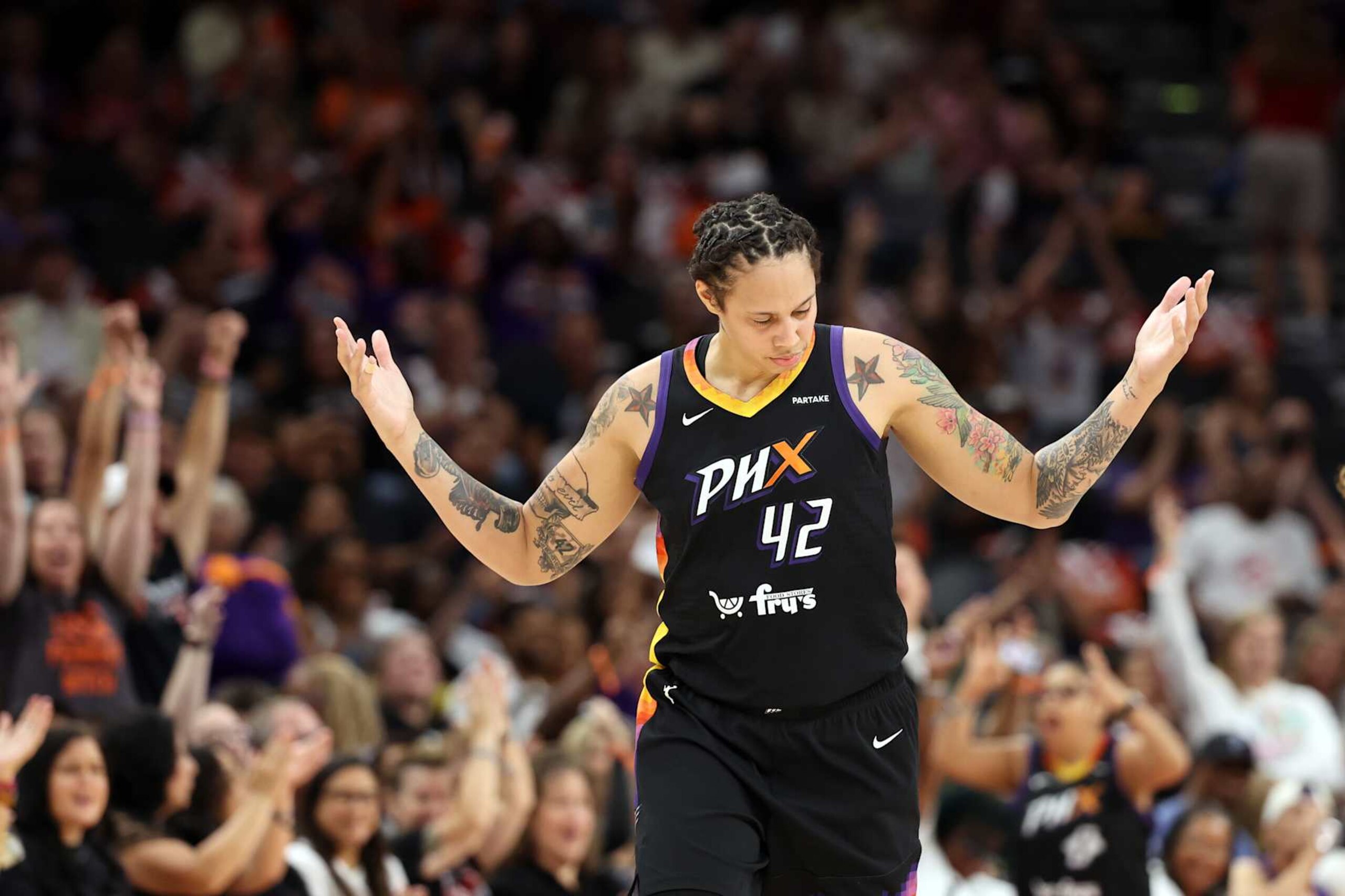 PHOENIX, ARIZONA - SEPTEMBER 13: Brittney Griner #42 of the Phoenix Mercury reacts after hitting a three point shot during the game against the Connecticut Sun at Footprint Center on September 13, 2024 in Phoenix, Arizona. The Sun defeated the Mercury 88-69. NOTE TO USER: User expressly acknowledges and agrees that, by downloading and or using this photograph, User is consenting to the terms and conditions of the Getty Images License Agreement. (Photo by Chris Coduto/Getty Images) PHOENIX, ARIZONA - SEPTEMBER 13: Brittney Griner #42 of the Phoenix Mercury reacts after hitting a three point shot during the game against the Connecticut Sun at Footprint Center on September 13, 2024 in Phoenix, Arizona. The Sun defeated the Mercury 88-69. NOTE TO USER: User expressly acknowledges and agrees that, by downloading and or using this photograph, User is consenting to the terms and conditions of the Getty Images License Agreement. (Photo by Chris Coduto/Getty Images)