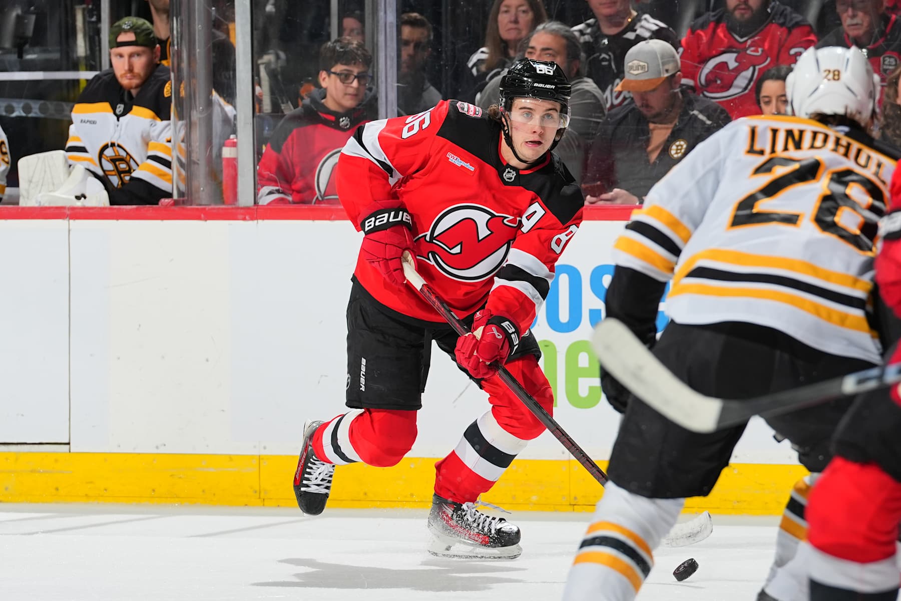 NEWARK, NJ - JANUARY 22: Jack Hughes #86 of the New Jersey Devils skates in the first period of the game against the Boston Bruins at the Prudential Center on January 22, 2025 in Newark, New Jersey.  (Photo by Rich G1raessle/NHLI via Getty Images)