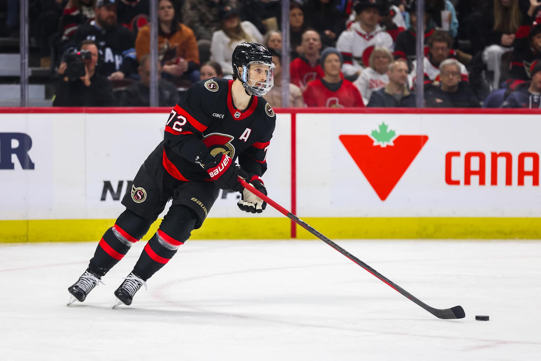 OTTAWA, ON - JANUARY 26: Ottawa Senators defenseman Thomas Chabot (72) skates with the puck during second period National Hockey League action between the Utah Hockey Club and Ottawa Senators on January 26, 2025, at Canadian Tire Centre in Ottawa, ON, Canada. (Photo by Richard A. Whittaker/Icon Sportswire via Getty Images)