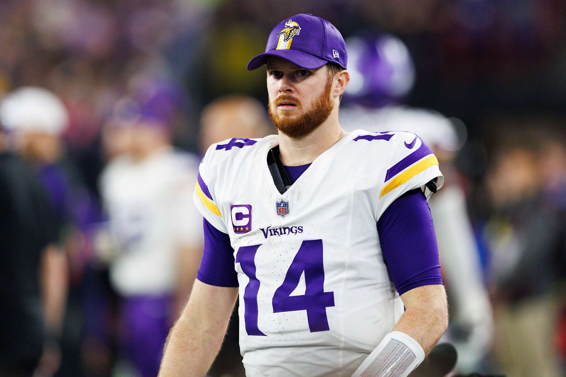 GLENDALE, ARIZONA - JANUARY 13: Sam Darnold #14 of the Minnesota Vikings on the sideline during the second half of the NFC Wild Card Playoff game against the Los Angeles Rams at State Farm Stadium on January 13, 2025 in Glendale, Arizona. (Photo by Ric Tapia/Getty Images) GLENDALE, ARIZONA - JANUARY 13: Sam Darnold #14 of the Minnesota Vikings on the sideline during the second half of the NFC Wild Card Playoff game against the Los Angeles Rams at State Farm Stadium on January 13, 2025 in Glendale, Arizona. (Photo by Ric Tapia/Getty Images)