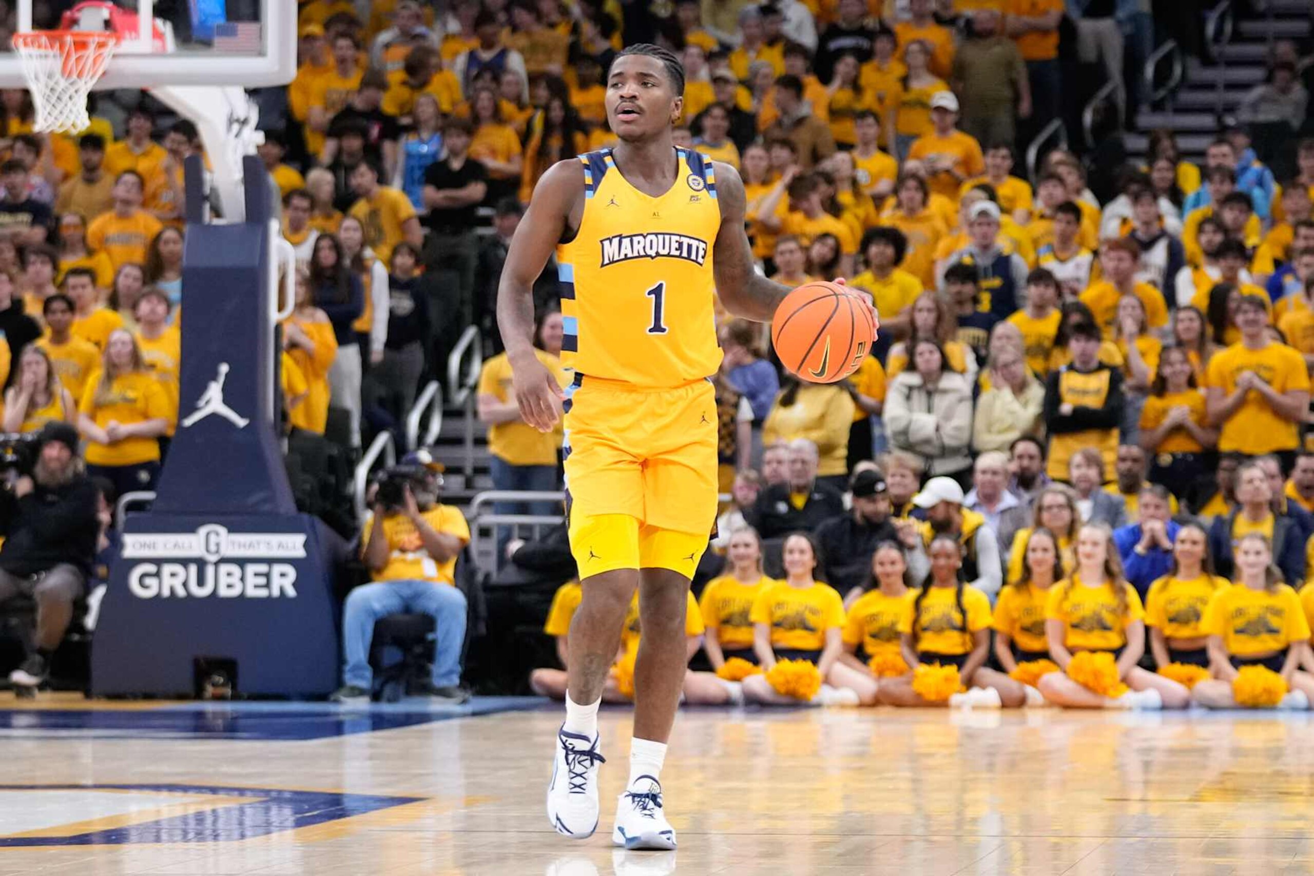 MILWAUKEE, WISCONSIN - JANUARY 24: Kam Jones #1 of the Marquette Golden Eagles handles the ball during the first half against the Villanova Wildcats at Fiserv Forum on January 24, 2025 in Milwaukee, Wisconsin.  (Photo by Kayla Wolf/Getty Images)
