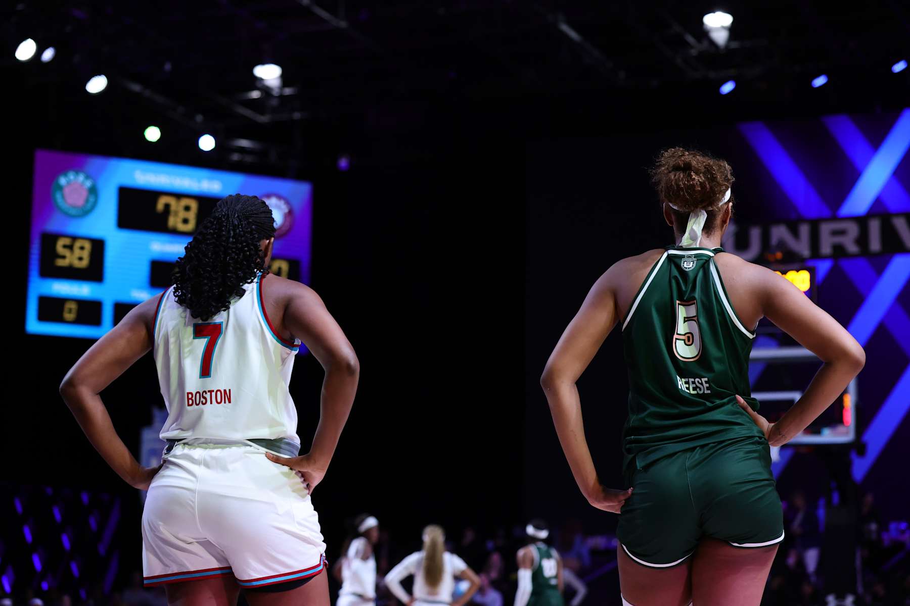 MEDLEY, FLORIDA - JANUARY 17: Angel Reese #5 of Rose stands alongside Aliyah Boston of the Vinyl during the second half at The Mediapro Studio on January 17, 2025 in Medley, Florida. (Photo by Carmen Mandato/Getty Images)