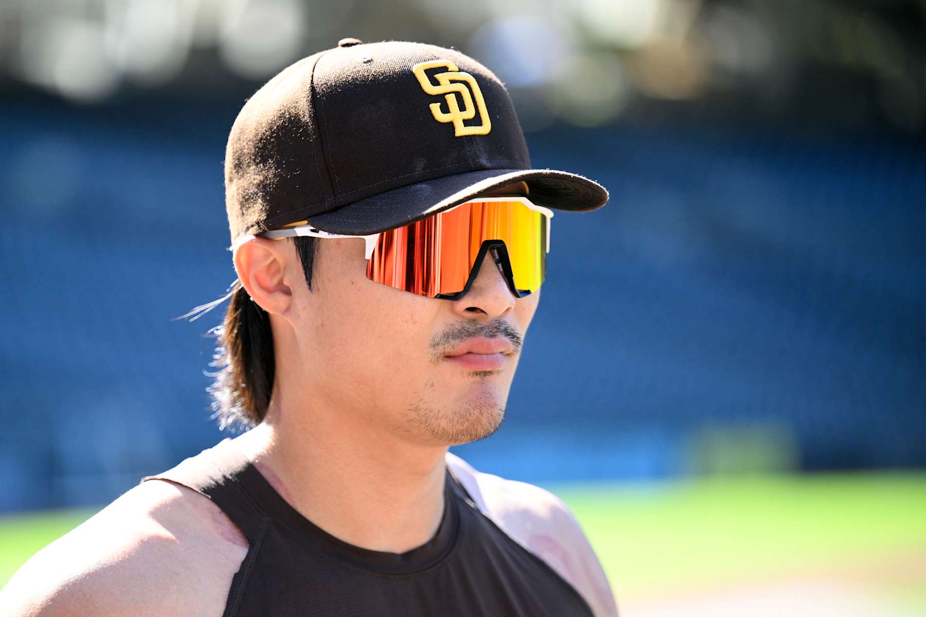 SAN DIEGO, CALIFORNIA - AUGUST 23: Ha-Seong Kim #7 of the San Diego Padres looks on before the game against the New York Mets at Petco Park on August 23, 2024 in San Diego, California. (Photo by Orlando Ramirez/Getty Images) SAN DIEGO, CALIFORNIA - AUGUST 23: Ha-Seong Kim #7 of the San Diego Padres looks on before the game against the New York Mets at Petco Park on August 23, 2024 in San Diego, California. (Photo by Orlando Ramirez/Getty Images)