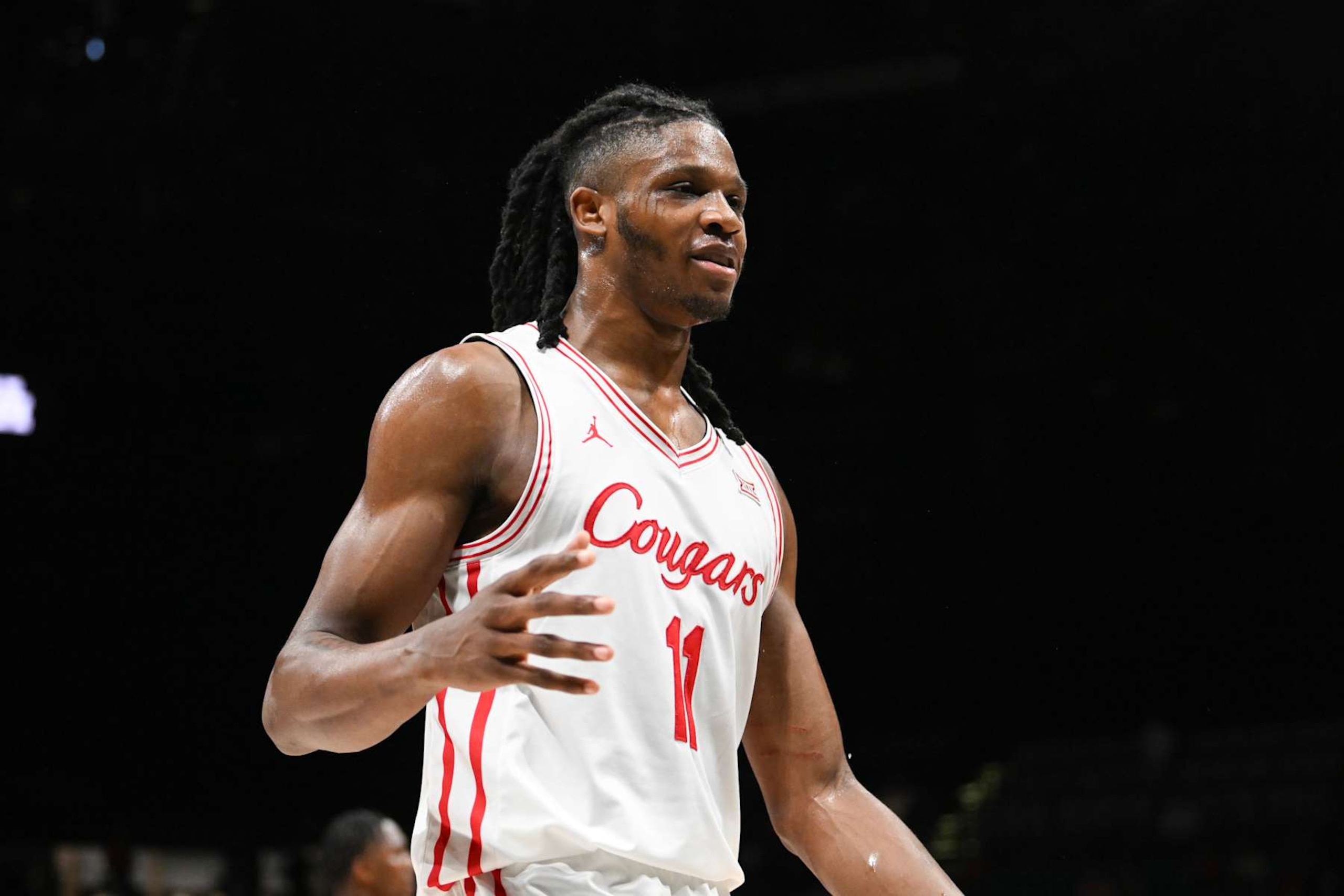 LAS VEGAS, NEVADA - NOVEMBER 26: Joseph Tugler #11 of the Houston Cougars reacts to a play against the Alabama Crimson Tide in the second half of their game during the Players Era Festival basketball tournament at MGM Grand Garden Arena on November 26, 2024 in Las Vegas, Nevada. The Crimson Tide defeated the Cougars 85-80 in overtime. (Photo by Candice Ward/Getty Images)