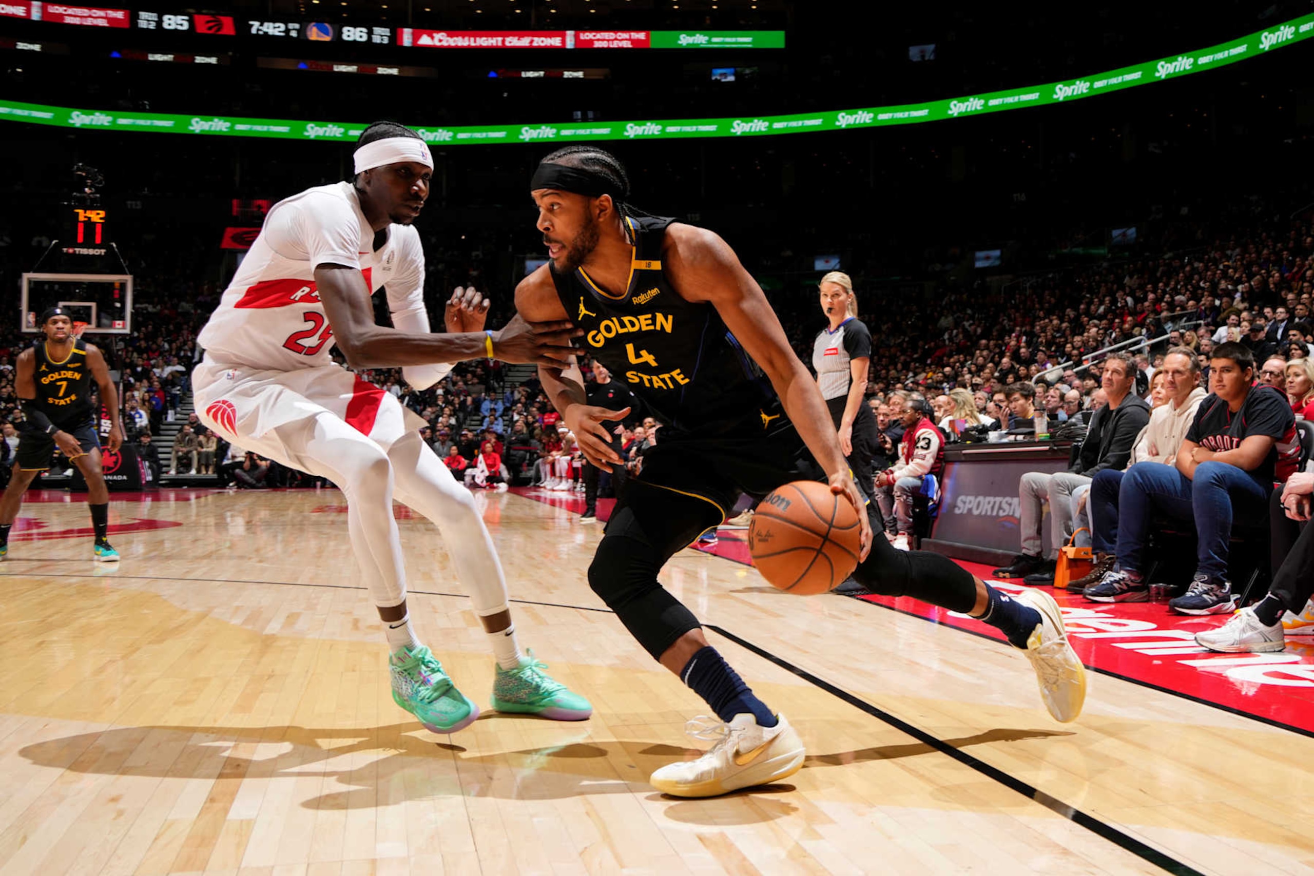 TORONTO, CANADA - JANUARY 13: Moses Moody #4 of the Golden State Warriors dribbles the ball during the game against the Toronto Raptors on January 13, 2025 at the Scotiabank Arena in Toronto, Ontario, Canada.  NOTE TO USER: User expressly acknowledges and agrees that, by downloading and or using this Photograph, user is consenting to the terms and conditions of the Getty Images License Agreement.  Mandatory Copyright Notice: Copyright 2025 NBAE (Photo by Mark Blinch/NBAE via Getty Images)